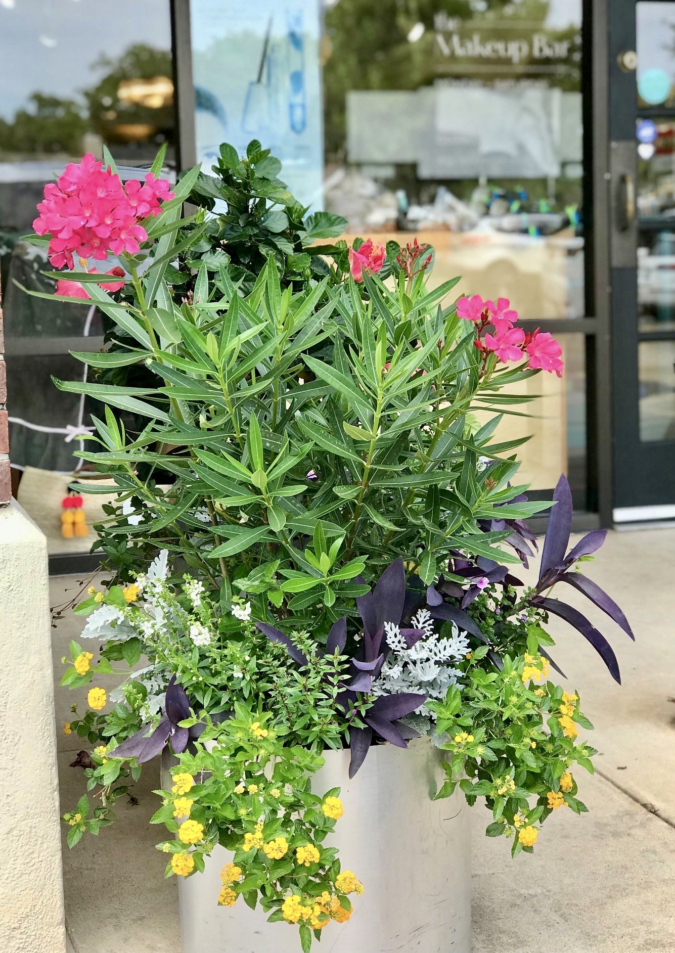 Curb Appeal Shout Out! WE LOVE ALEX and her fabulous store, The MakeUp Bar. This store has been THE place to buy make up and skin care products in OKC since 2001. They also offer a full array of aesthetic treatments (We can vouch for their amazing facials). If you need any beauty products for a male or female loved one … run don’t walk to The MakeUp Bar. Alex and her team will hook you up! We’ve been digging in the dirt at The MakeUp Bar and Alex's home for 6 years. Alex says it best when asked about why she reached out to Adorn. "Oh Lordy, anybody who knows me, knows I can't keep a plastic plant from turning yellow. So when I saw an instagram post about Adorn, I immediately called and inquired! After talking to Elizabeth I felt like she really heard what I was saying and that I needed low maintenance. After she was done with my pots at home they looked so incredible I had her do the pots at The MakeUp Bar. I couldn't stop singing her praises and telling all my friends and clients about her. Adorn is a luxury and sometimes I have to really budget it in, but it is a treat that keeps on giving every time I walk in at home or at work! I will always use and recommend Adorn." Awwww thank you Alex! We love you too!