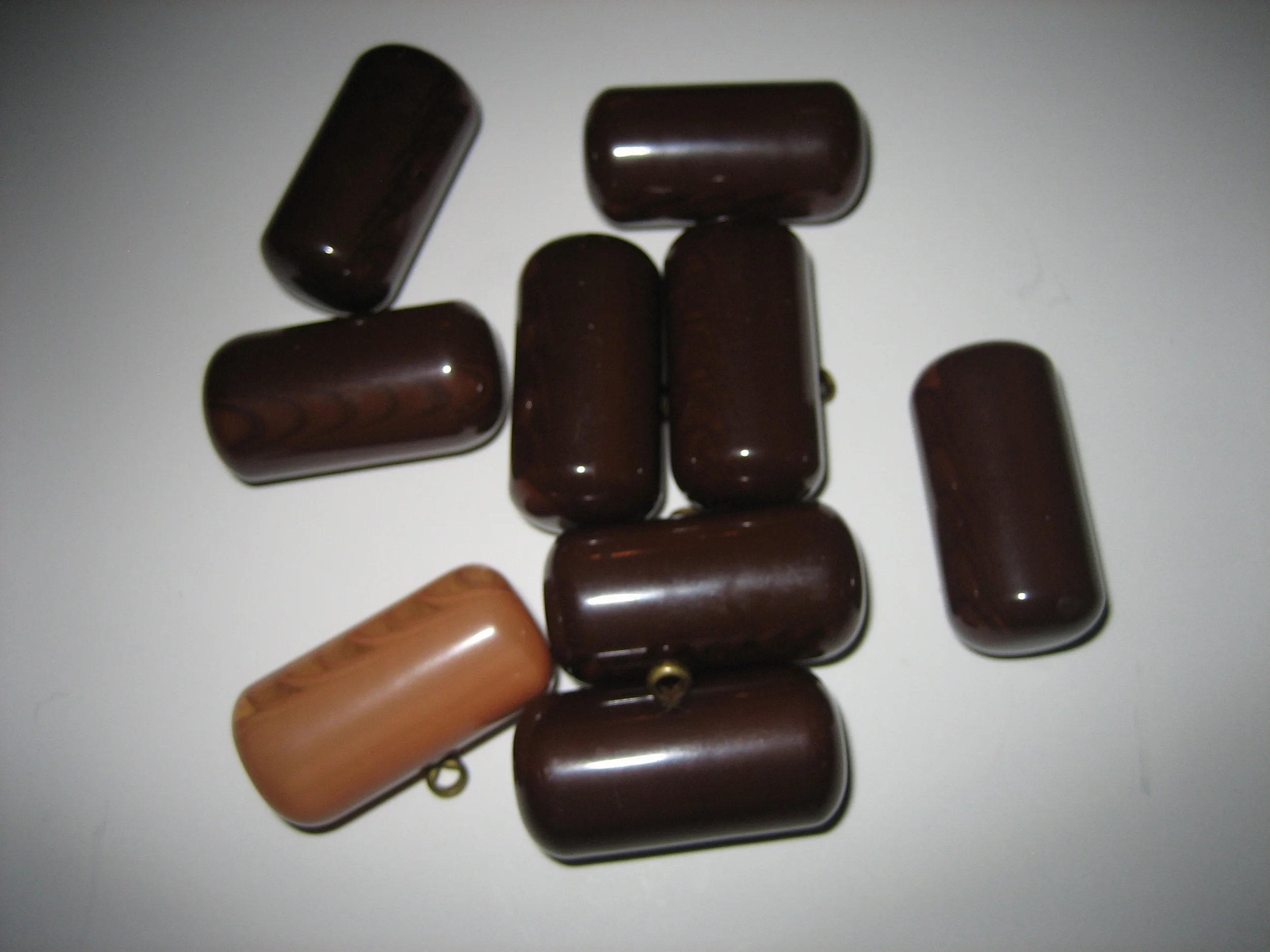 Set of 9 Shiny Barrel Bakelite Buttons