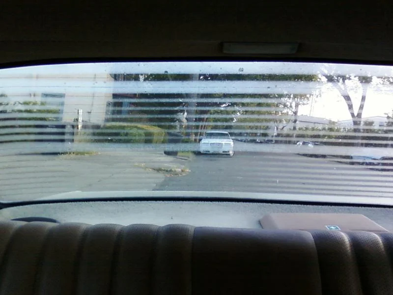 Condensation evapourating as rear windscreen heats up