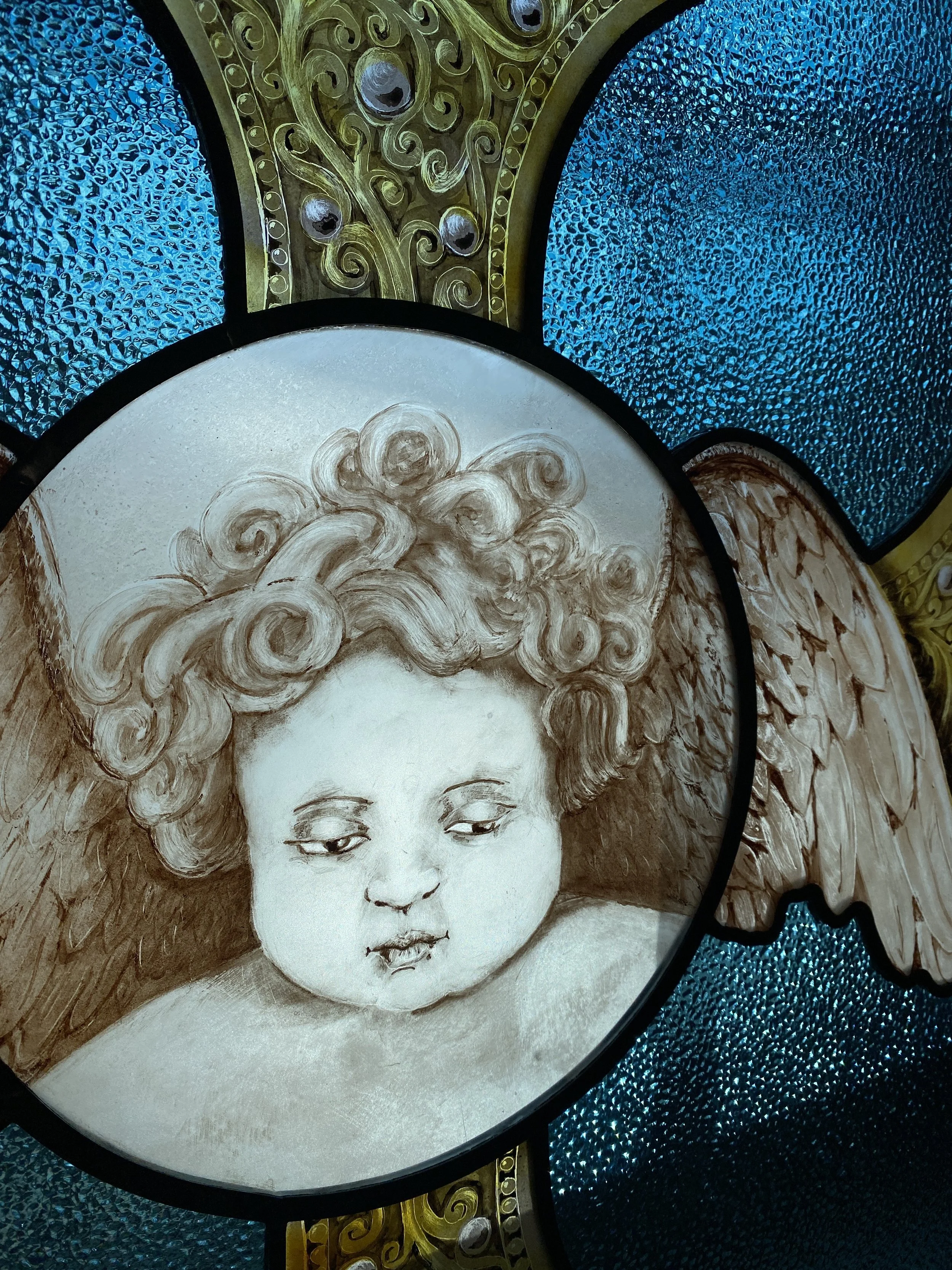 Cherub window from Belmont Chapel in Newport, Rhode Island