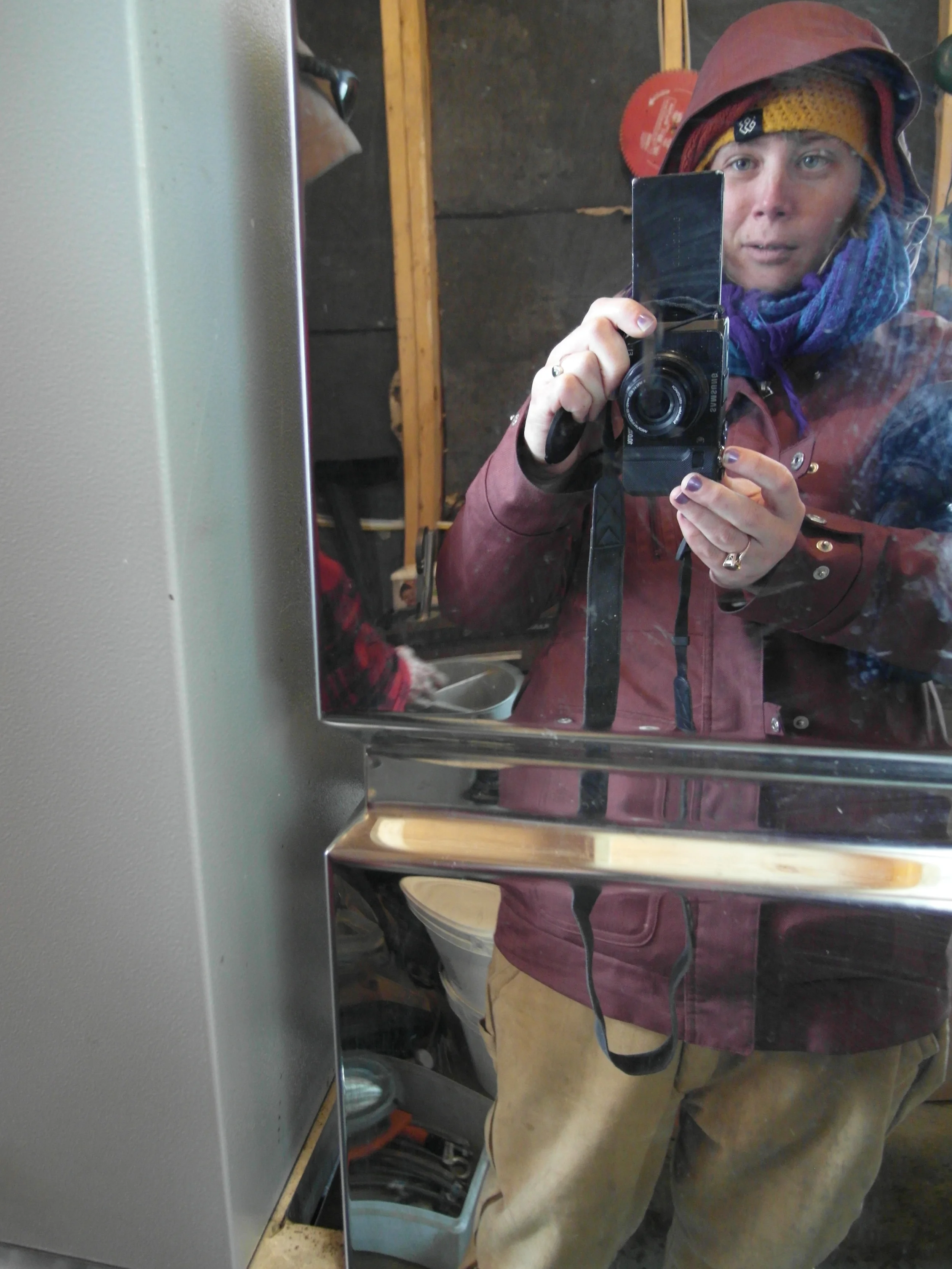 An icy selfie taken in the stainless steel reflection of the Reverse Osmosis machine. 