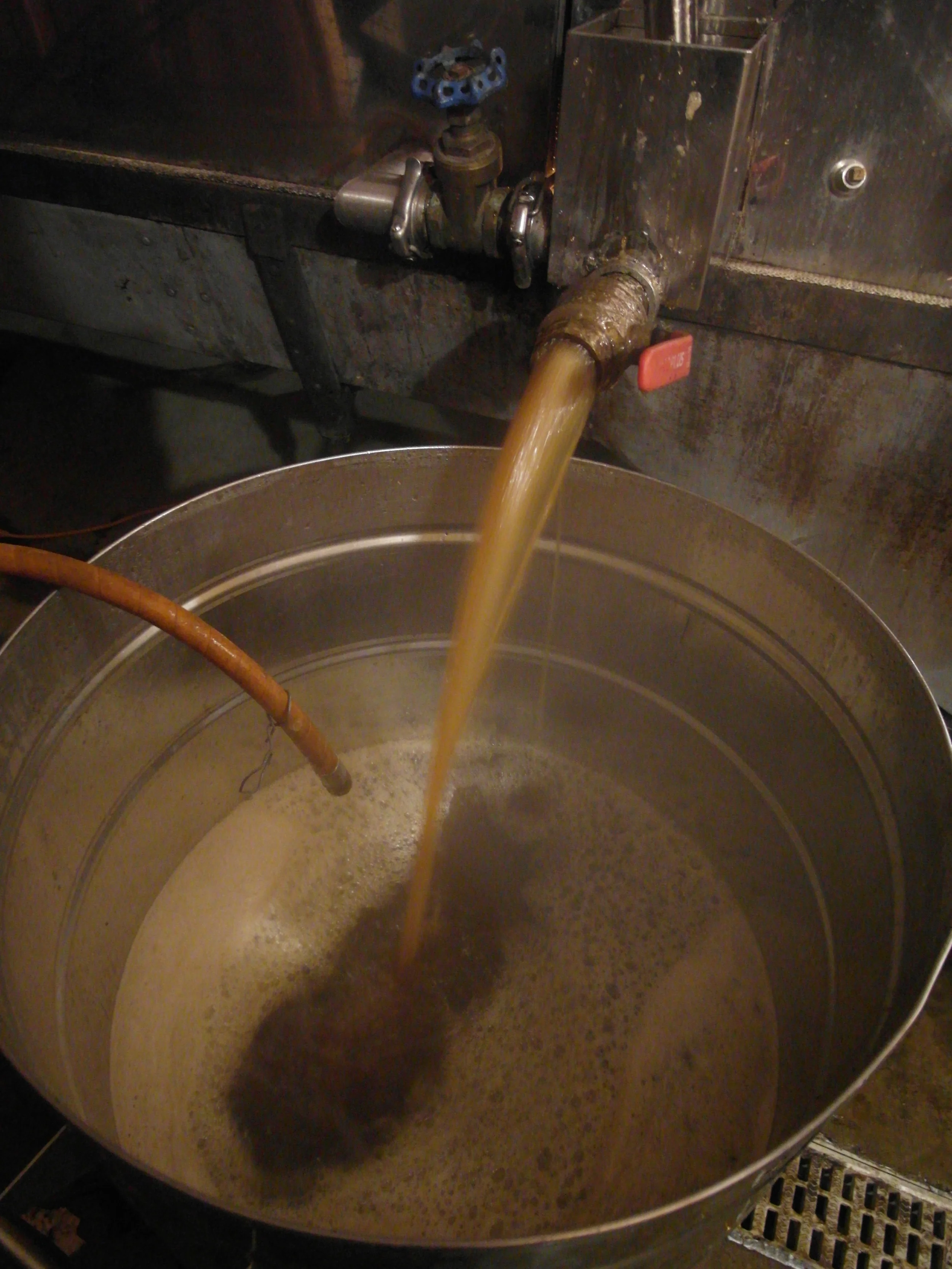Drawing syrup off the evaporator before filtering it.