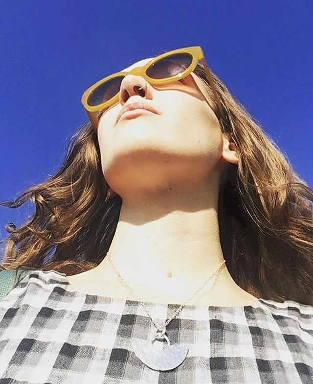 @izzyhodgeillustration providing an antidote to this dark stormy weather with this lush pop of blue, wearing our Arc necklace in eco silver 💕