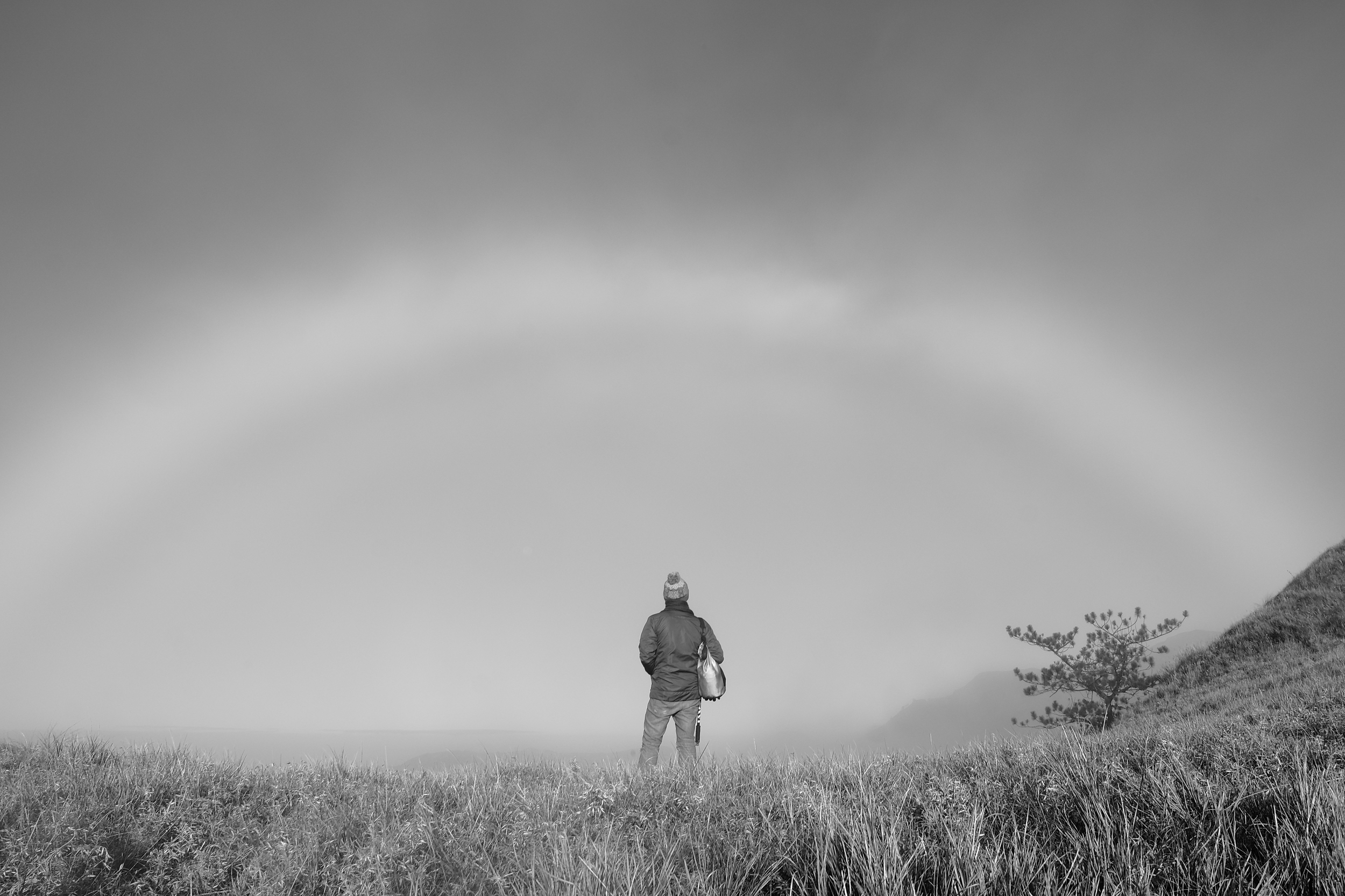 A hiker at the peak Mount Pulag National Park in Kabayan, Benguet. Due to to an influx of visitors, restrictions will soon be imposed to regulate foot traffic in this mountain to protect the forests and its residential areas.