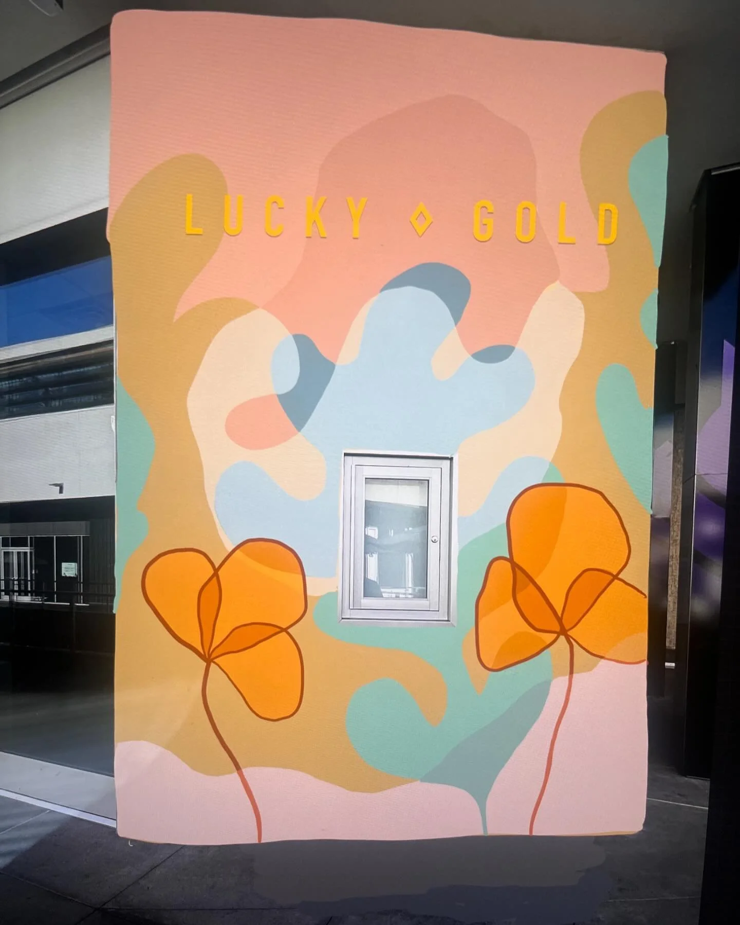 Mural mock up for Lucky Gold Permanent Jewelry in DOCO