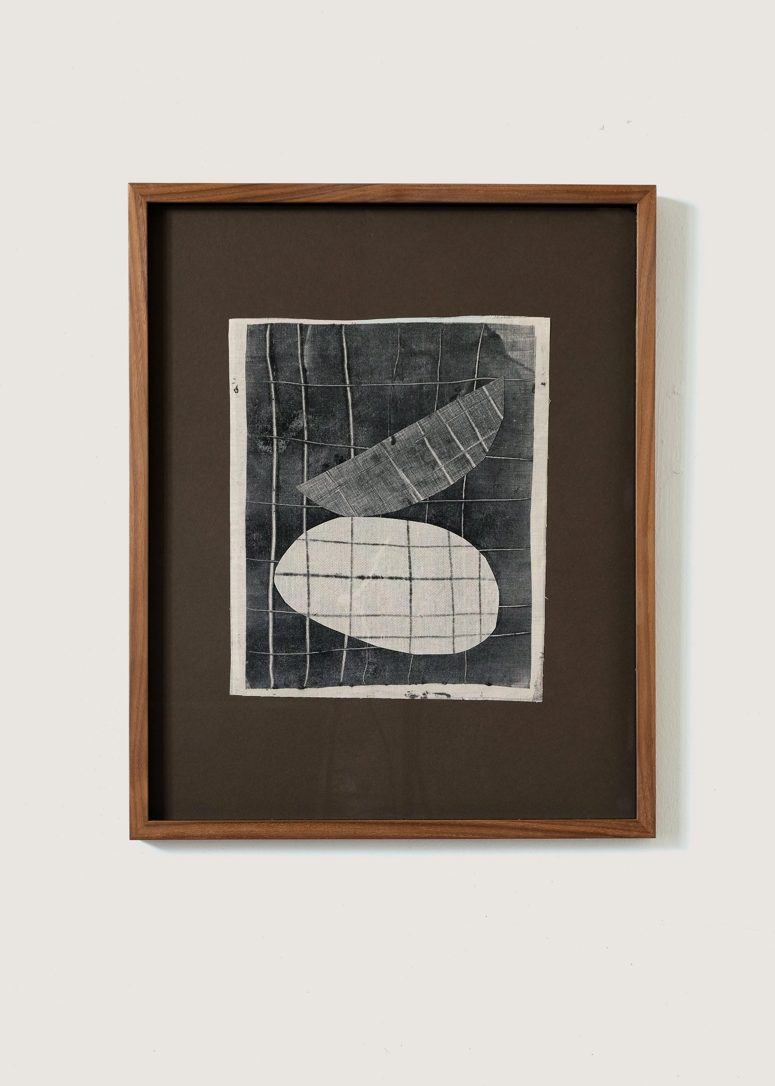Mono printed collage by House of Quinn. Black and white abstract forms with grid work and overlapping shapes.
