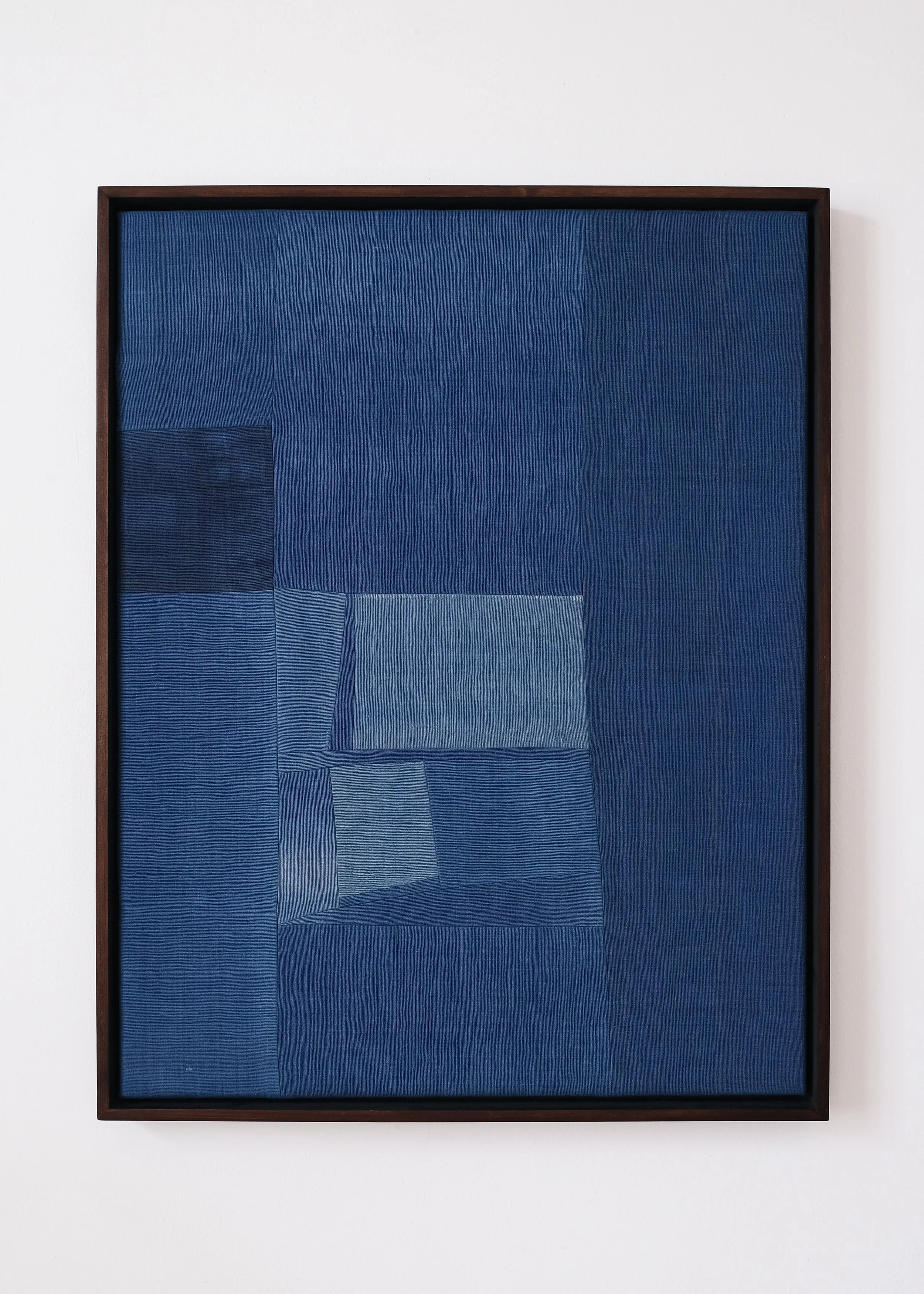 Contemporary textile artwork in hues in indigo blue by House of Quinn