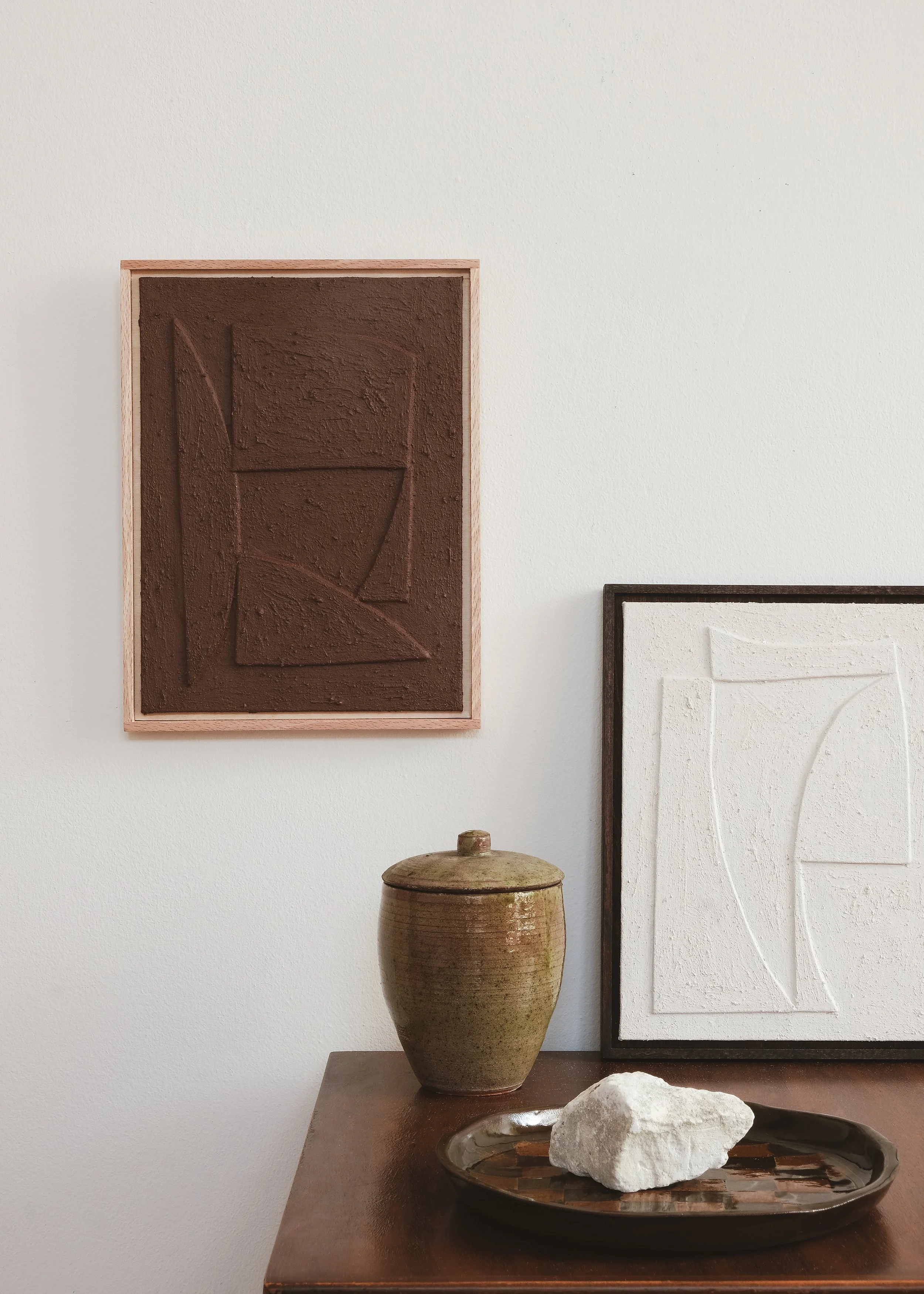Caer XV in Clay. Relief paintings by House of Quinn. Made from Earth pigments and ash.