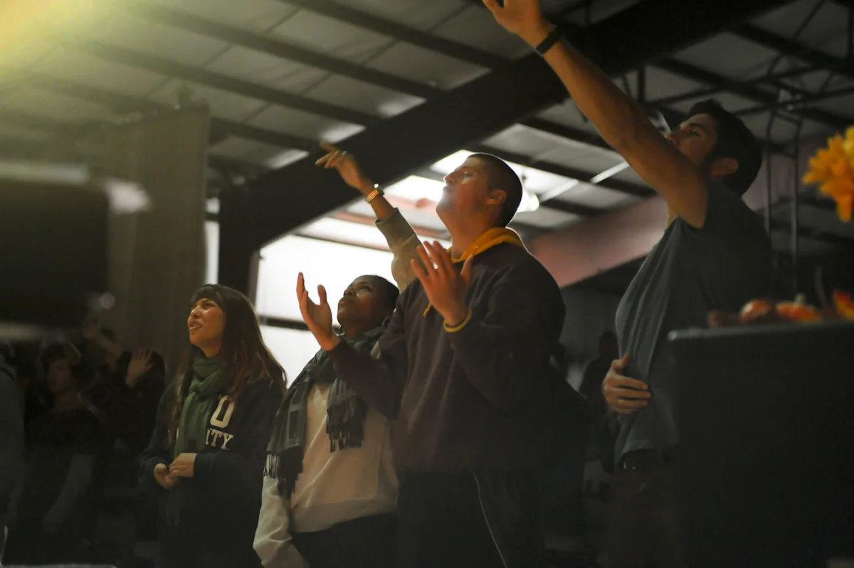 Students worship at Fall Retreat. 