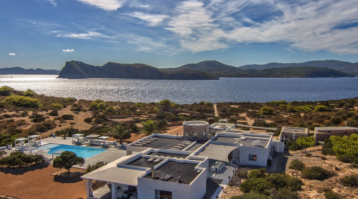 The private island: Tagomago, Ibiza Charming chiringuitos & coastal coves, Ibiza remains one of Europe's most popular summer destinations; but set on a private paradise 900 metres off its north-east coast lies a serene retreat like no other. Accessed by boat or helicopter to arrive in style, Tagomago's five-bedroom estate is the ultimate way to experience Ibiza. Perched on a hill surrounded by spacious terraces with panoramic views in all directions, this is beyond luxury. The perfect place to party or make the most of the private island with family & friends, you are just a stone's throw from one of Europe's most sought-after spots.