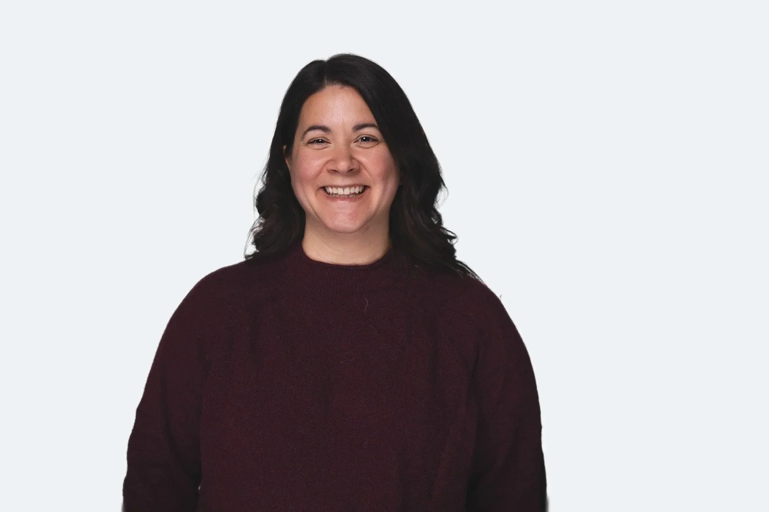 Professional headshot against a white background.