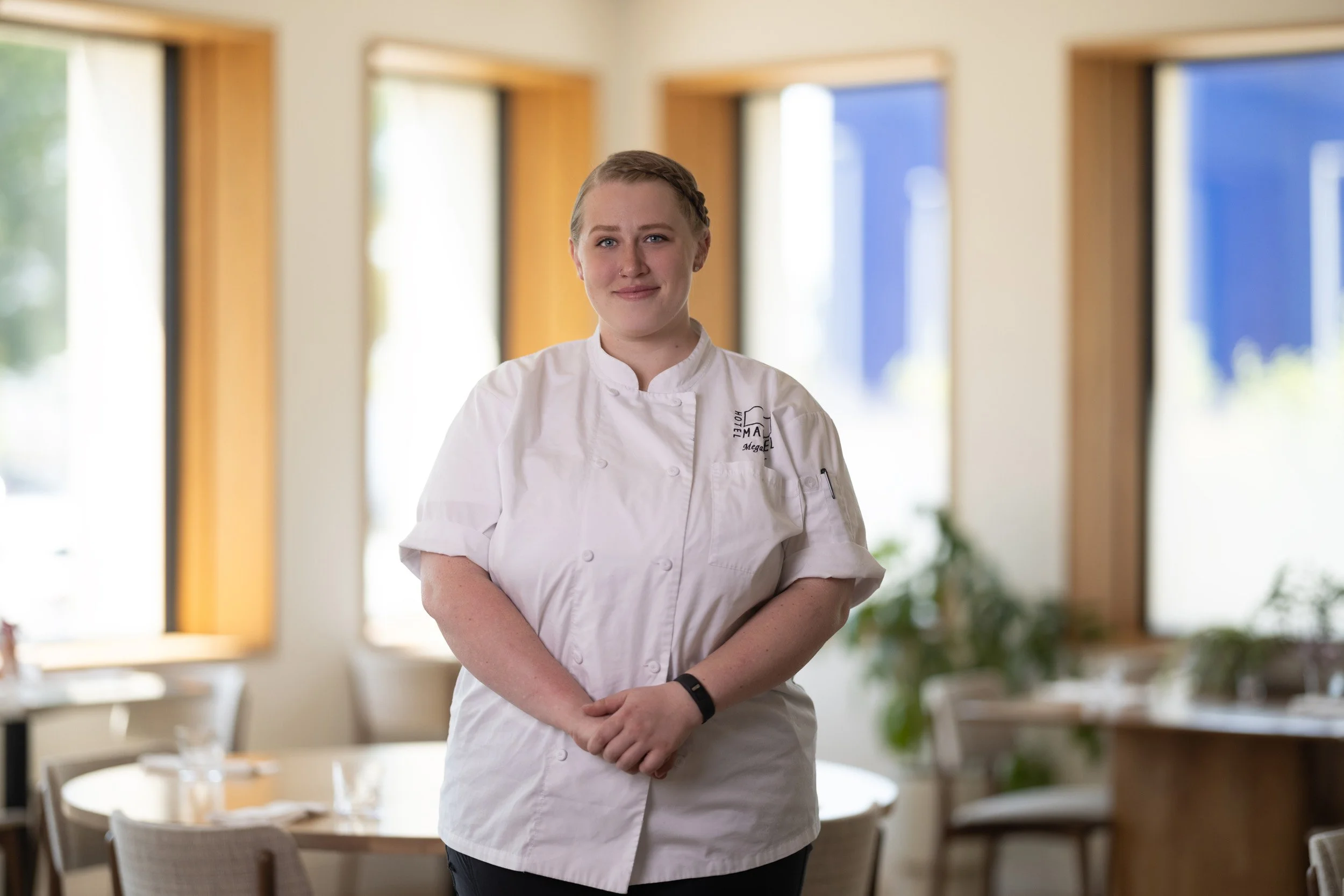 Environmental portrait of a chef in the dining room at Hotel Marcel in New Haven, Connecticut