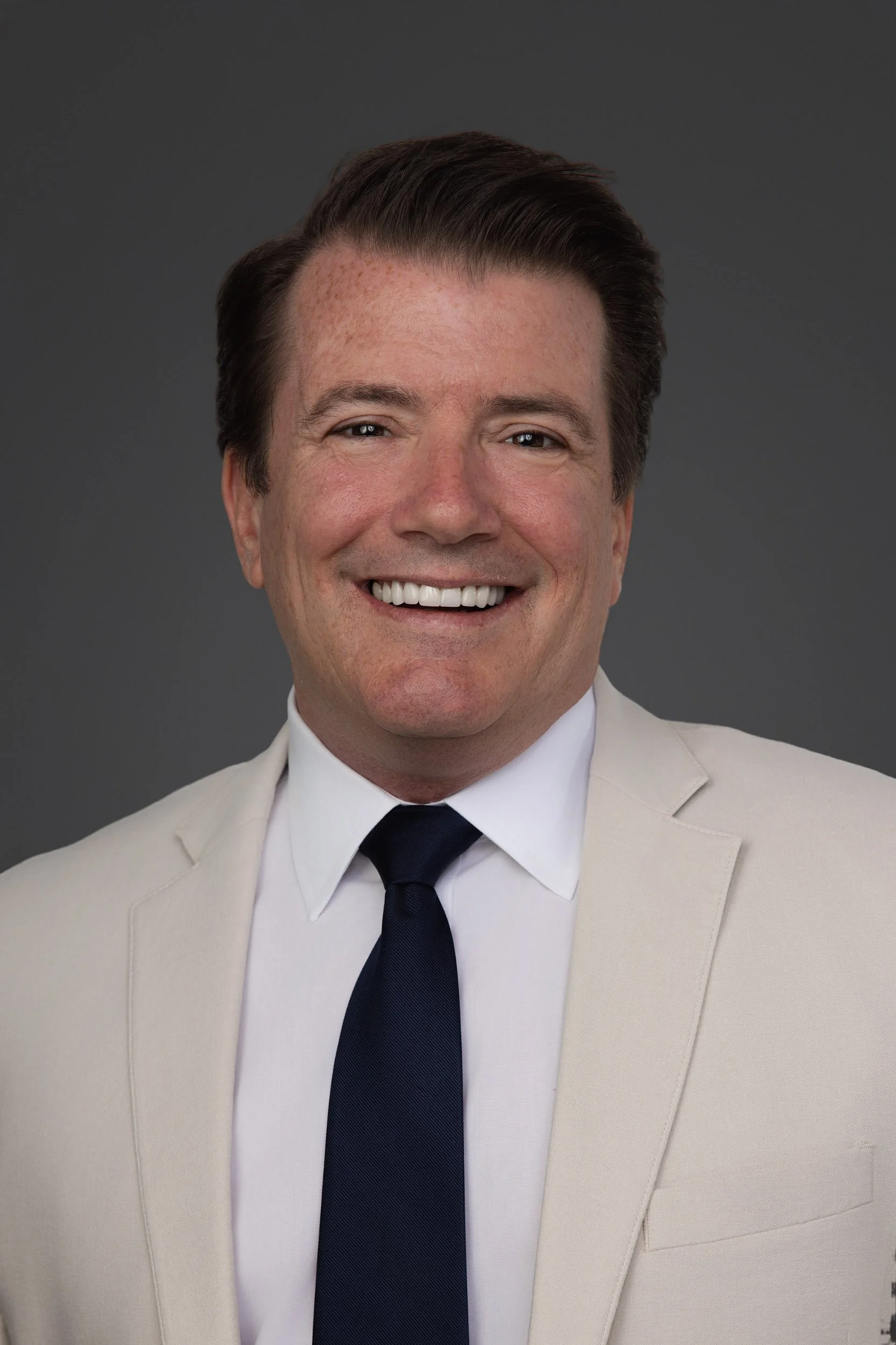 Corporate Team Headshot Taken in Connecticut with dark background