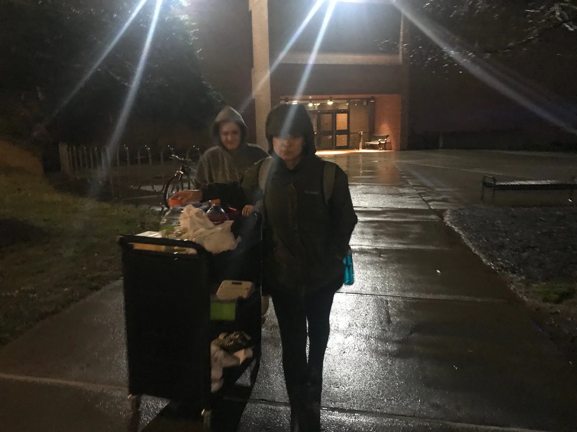 Late night at Walters. Zoey doesn't like rain...at least they are still smiling! Oh wait.