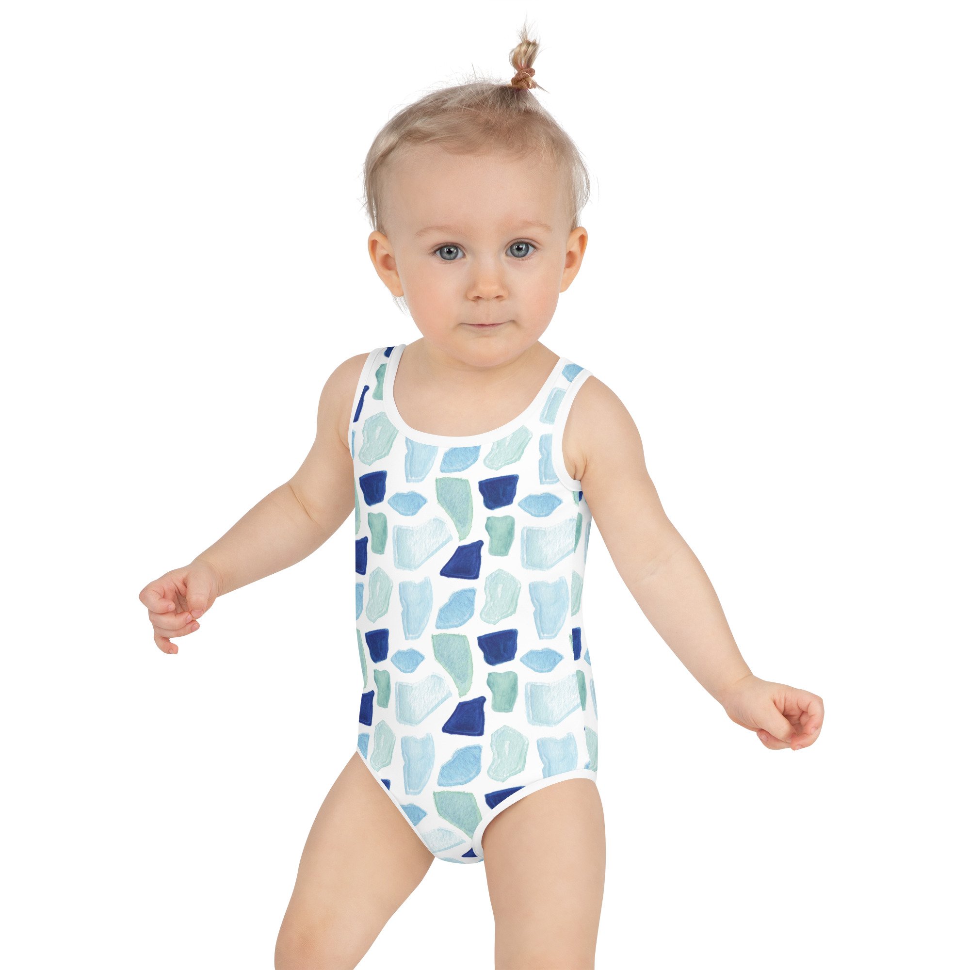 all-over-print-kids-swimsuit-white-front-652cc4d43c134.jpg