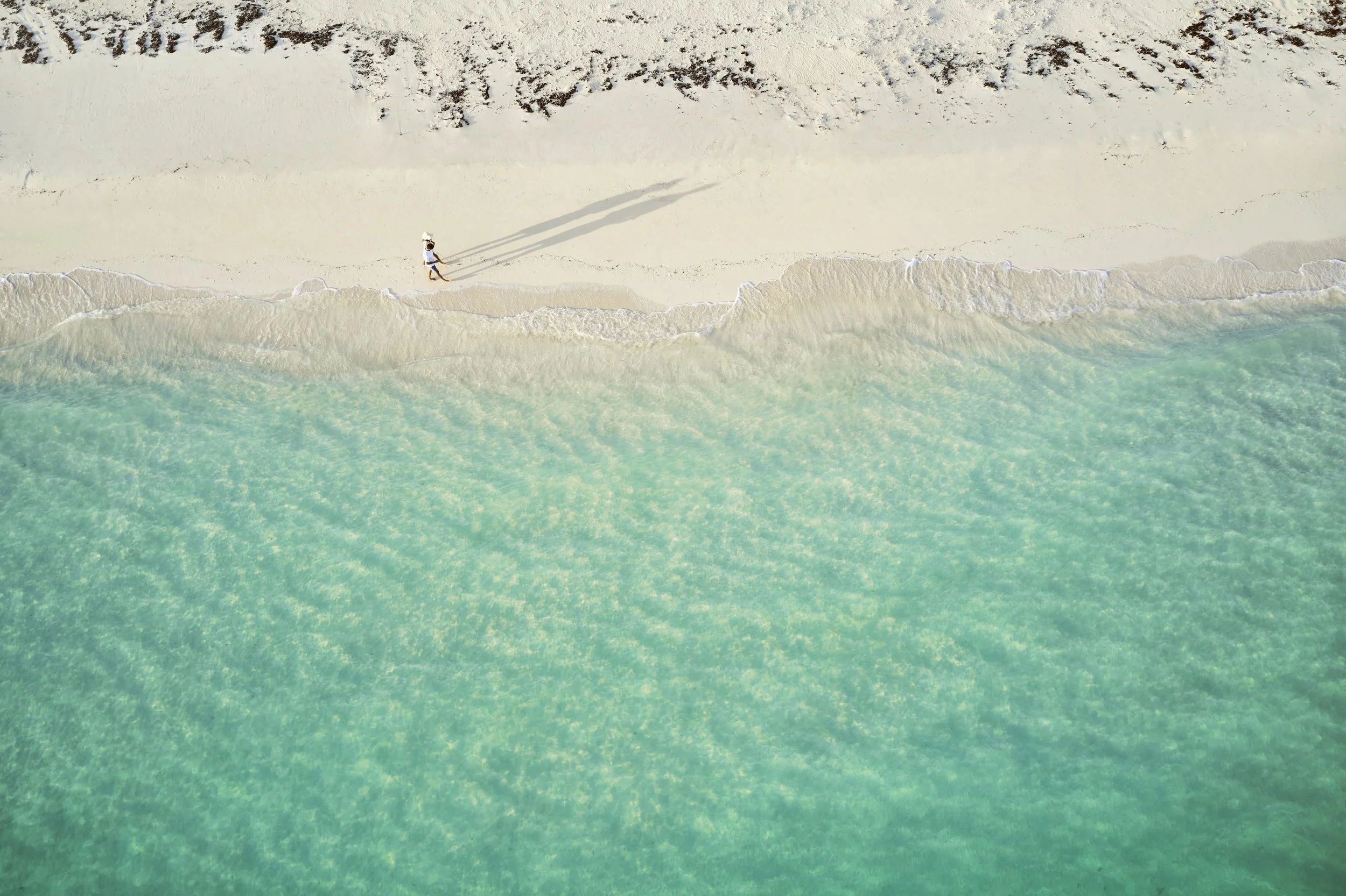 PC Aerial_Beach_Walk_couple copy 2.jpeg