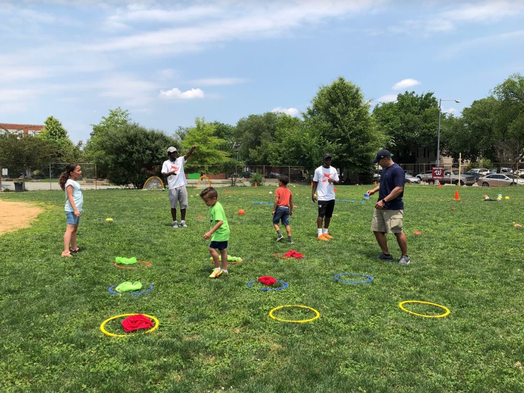 Players at DC Way's Free Festival practicing quick decision making with a game of tic-tac-toe!
