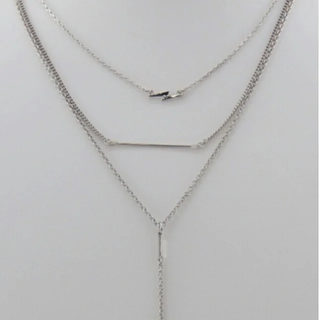 Zap Layered drop necklace. . Gold or silver. . Goes well with a tank top or t-shirt. #layerednecklace #layeredjewelry #Chicaccessories #simpleandchic