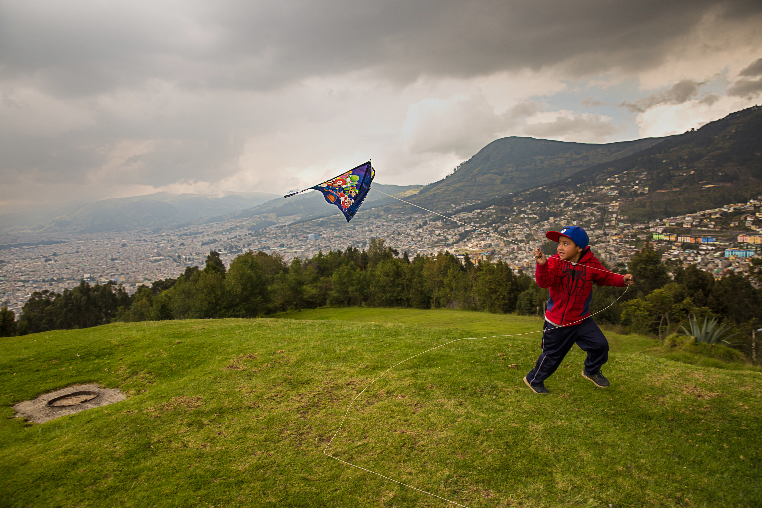 Flying a kite in the mountains of Quito, Ecuador. 