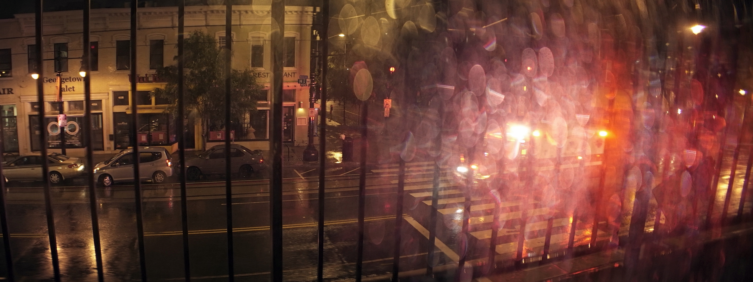 Elite 24.5mm anamorphic | Washington D.C. - An ambulance rushes past a rain-soaked window in Washington D.C. T2.1. Photo by Keith Nickoson.