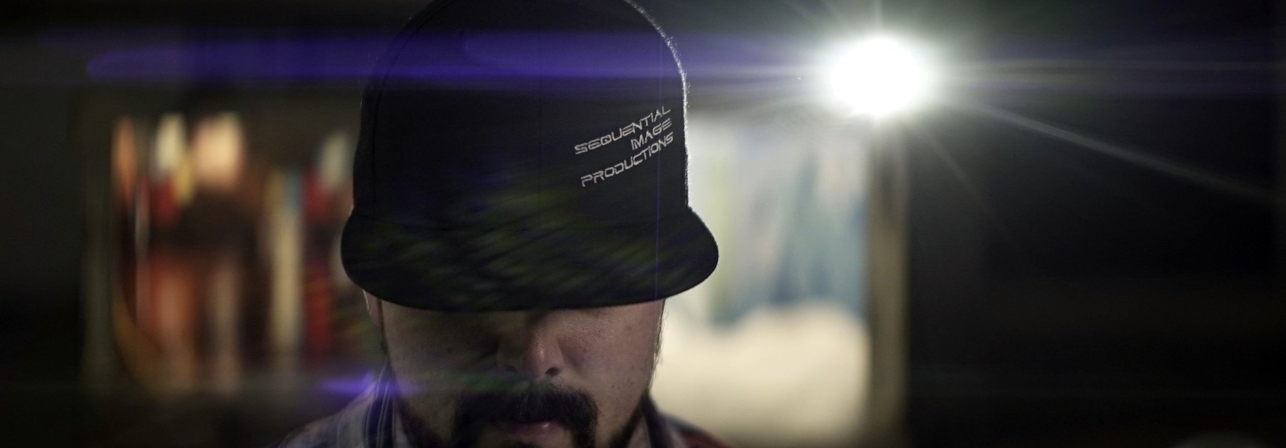 Lomo 100mm anamorphic lens | Another frame from the warehouse with Ryan Keeper, we can see some veiling glare in this one. Photo by: Keith Nickoson.
