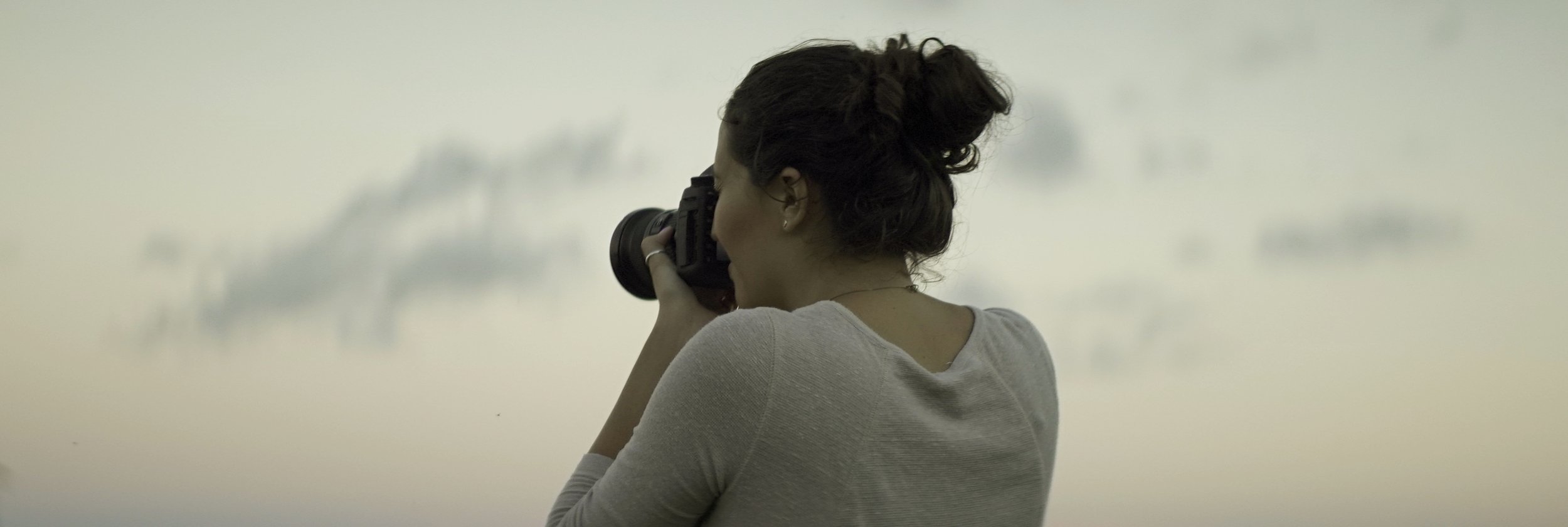 Lomo 100mm anamorphic lens | Olivia snapping a photo on the Canon 5D mark iii - Mackinac Island, MI - Photo by: Keith Nickoson