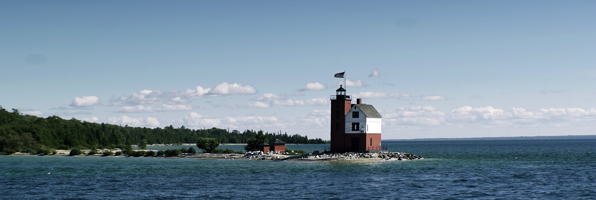 Lomo 100mm anamorphic lens | Round Island Lighthouse - Mackinac Island, MI. This lighthouse was featured throughout the film Somewhere in Time. Click this link HERE for more information about this lighthouse. I really think I overdid it with the saturation on this pic though. Photo by: Keith Nickoson