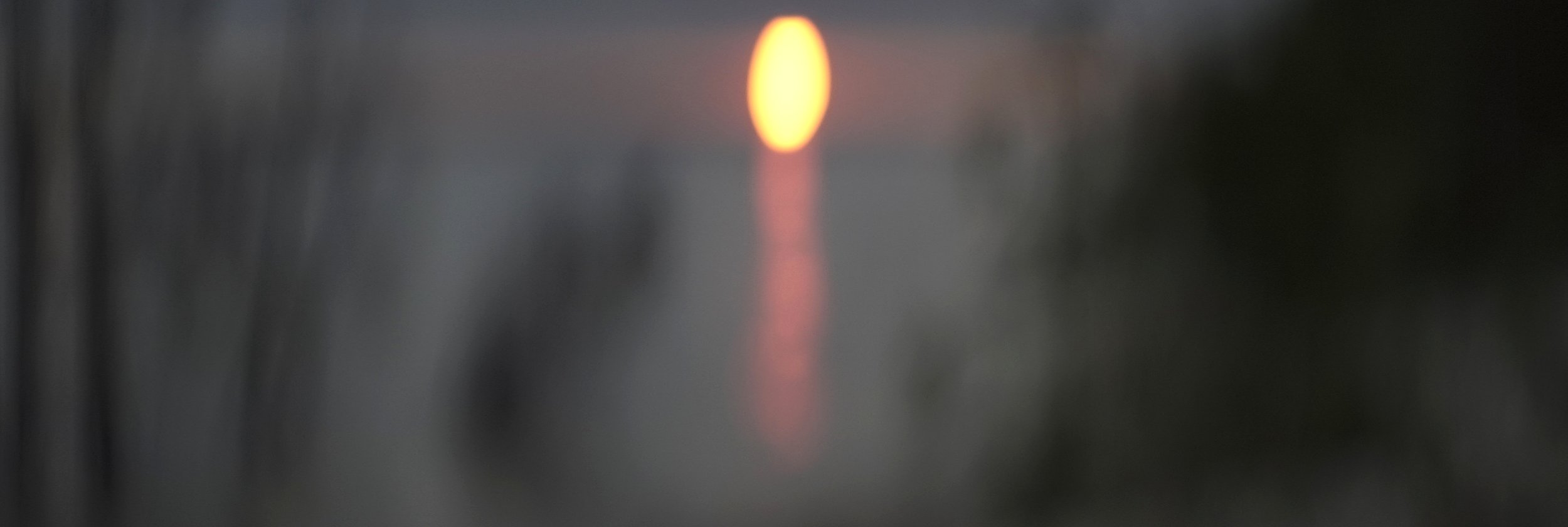 Lomo 100mm anamorphic lens | Vacant near focus of the setting sun. - Photo by: Keith Nickoson