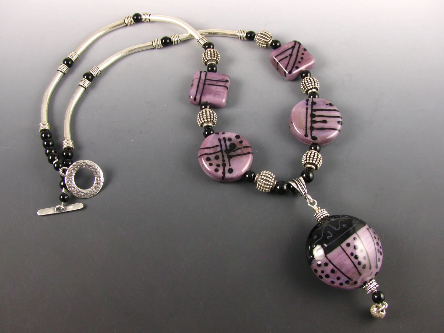 Mystic purple & black tiny stringer.jpg