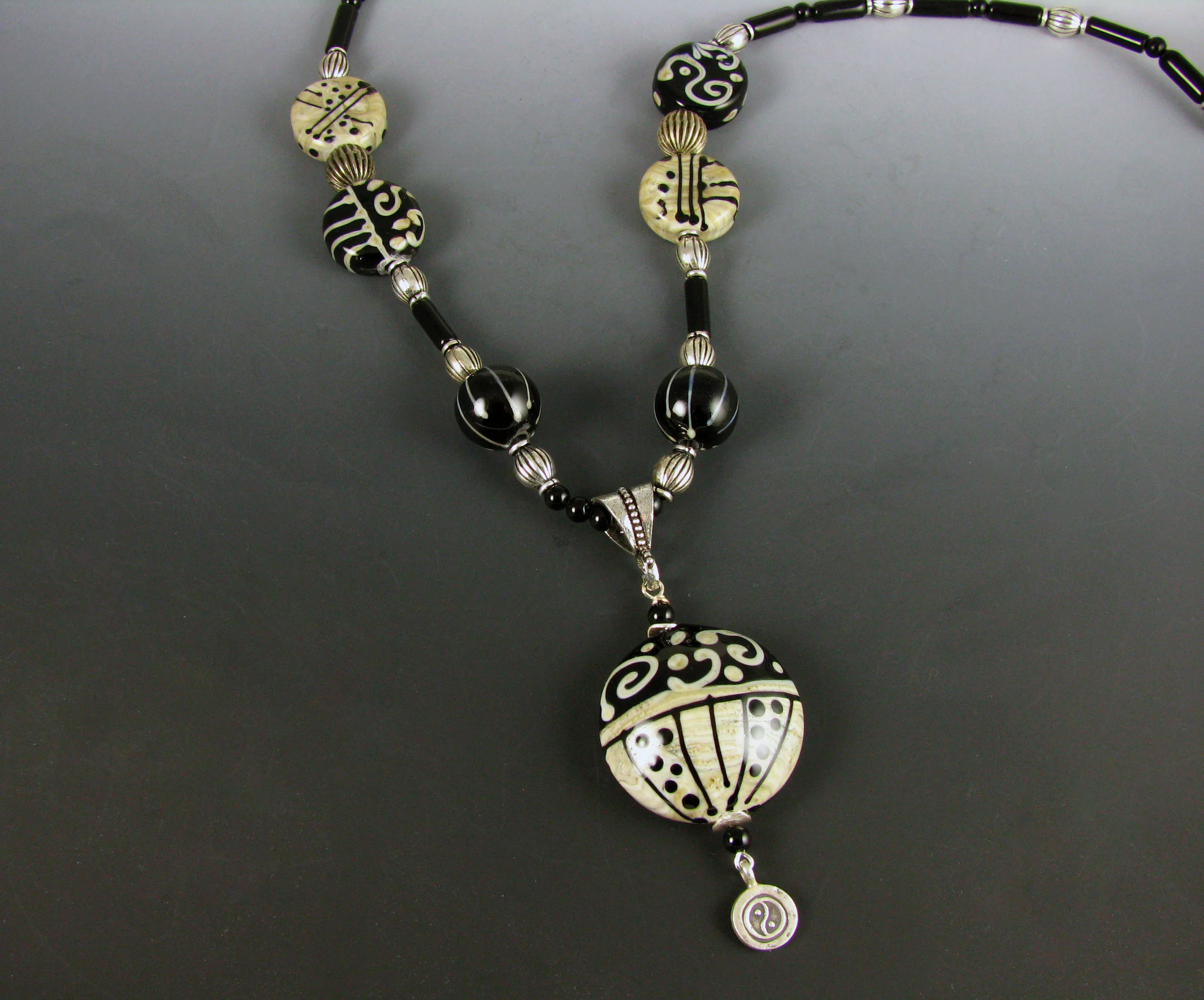 Fossil & black with pendant.jpg