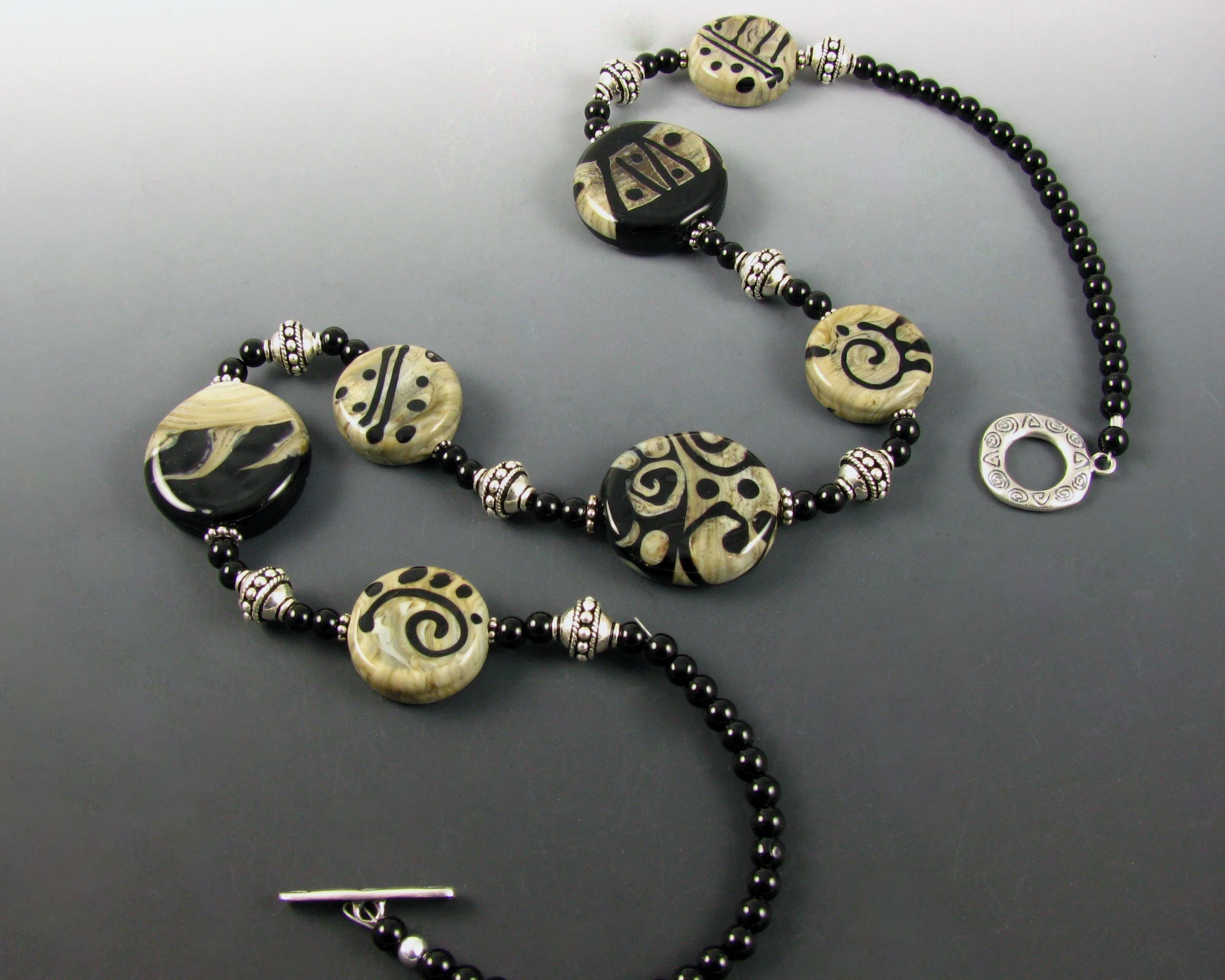 Fossil and black necklace.jpg