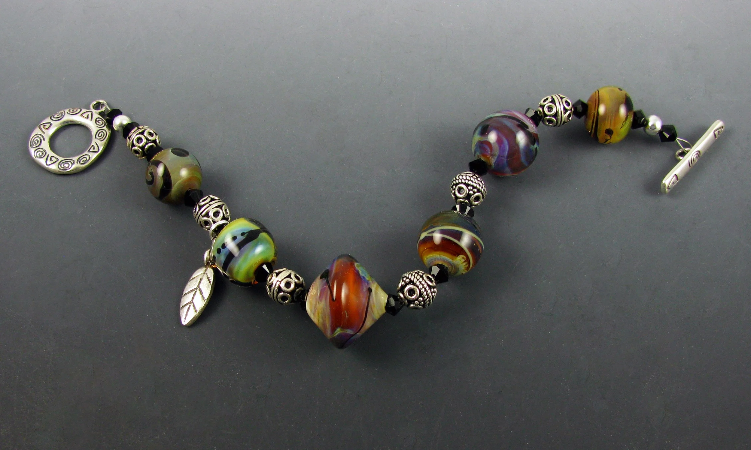 Tiny SR mix bracelet with charm.jpg