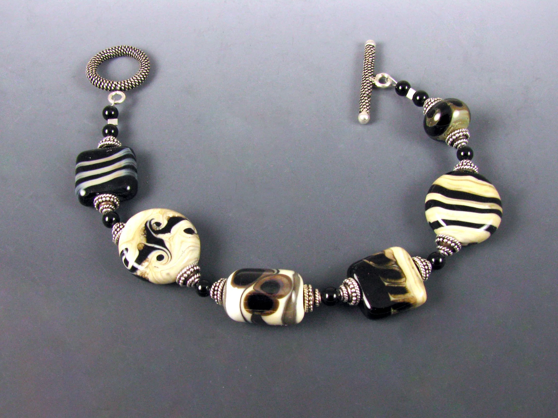 Fossil and black bracelet.jpg