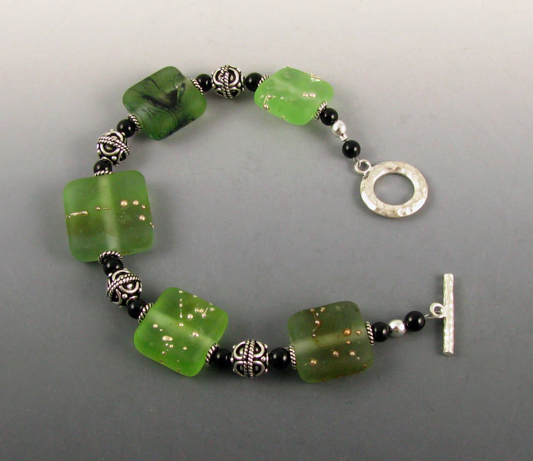 Green etched bracelet.jpg
