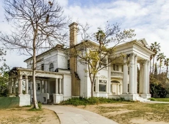 Historic Beckett mansion in Los Angeles is a Colonial Revival home built in 1905. Currently uninhabitable, it has been rented out as set for haunted house movies for many years and is believed to still be on the market.