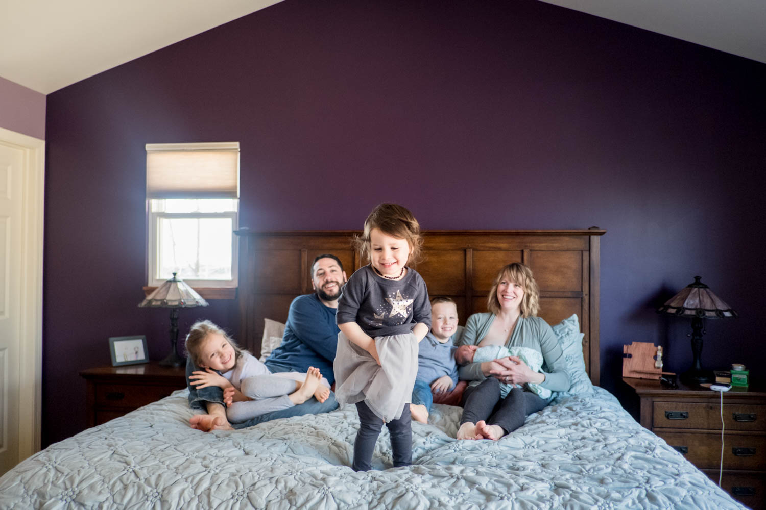 family-with-newborn-on-bed-chicago-newborn-photography--4.jpg