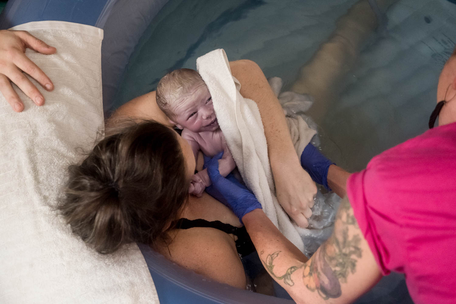 baby is being born during a homebirth in chicago-9030.jpg