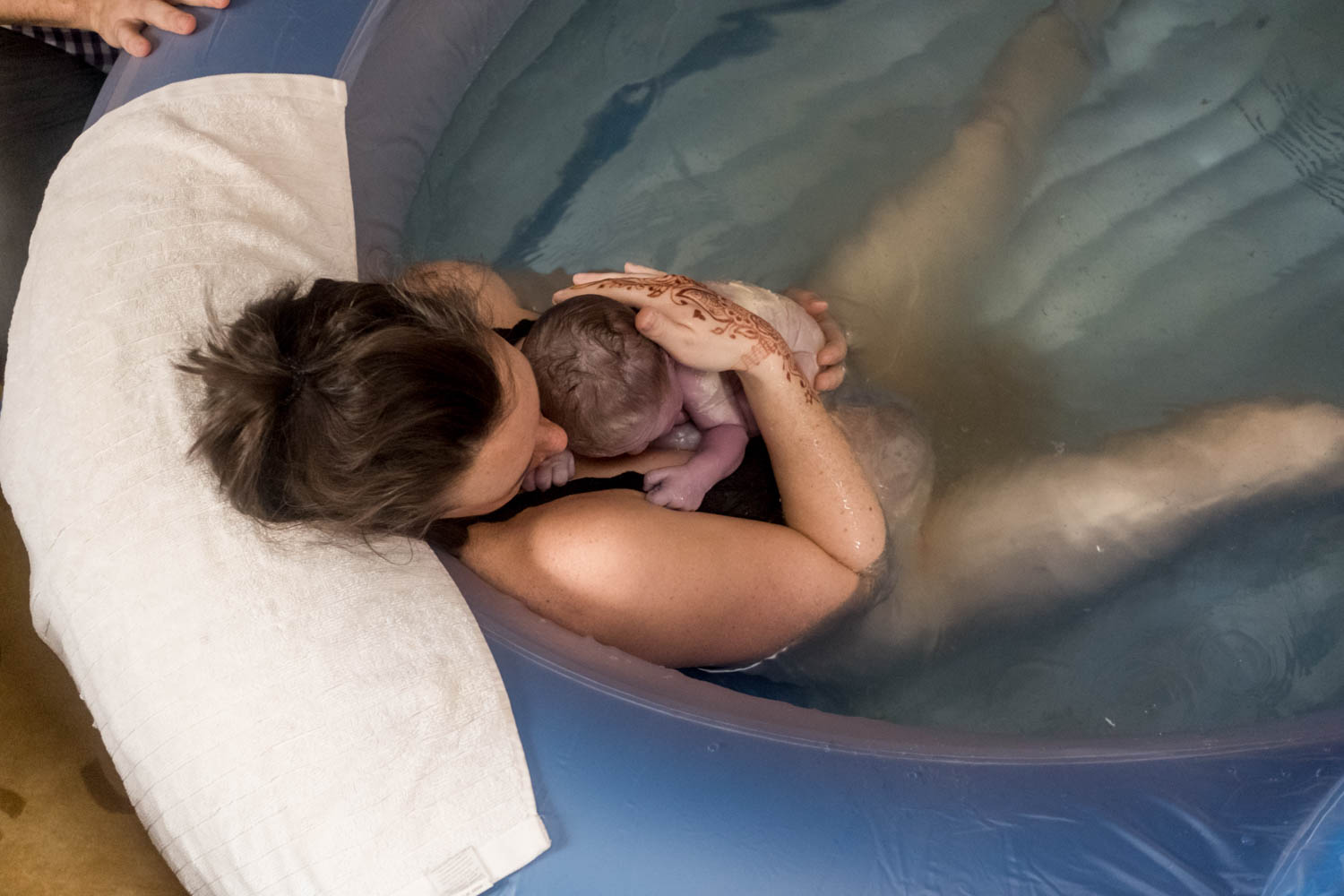 baby is being born during a homebirth in chicago-7028.jpg