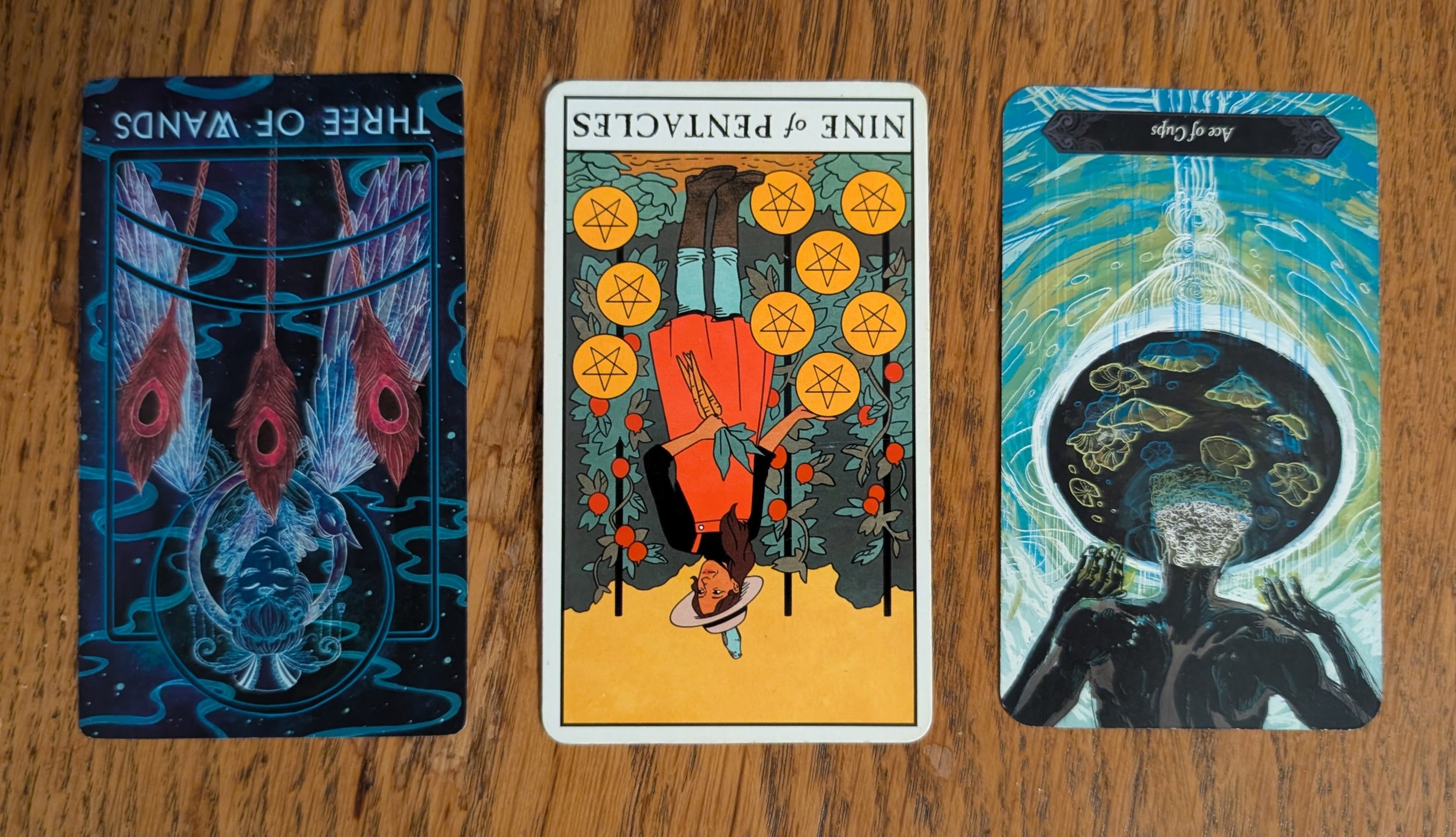 Full Moon: Three of Wands, Nine of Pentacles, and the Ace of Cups.