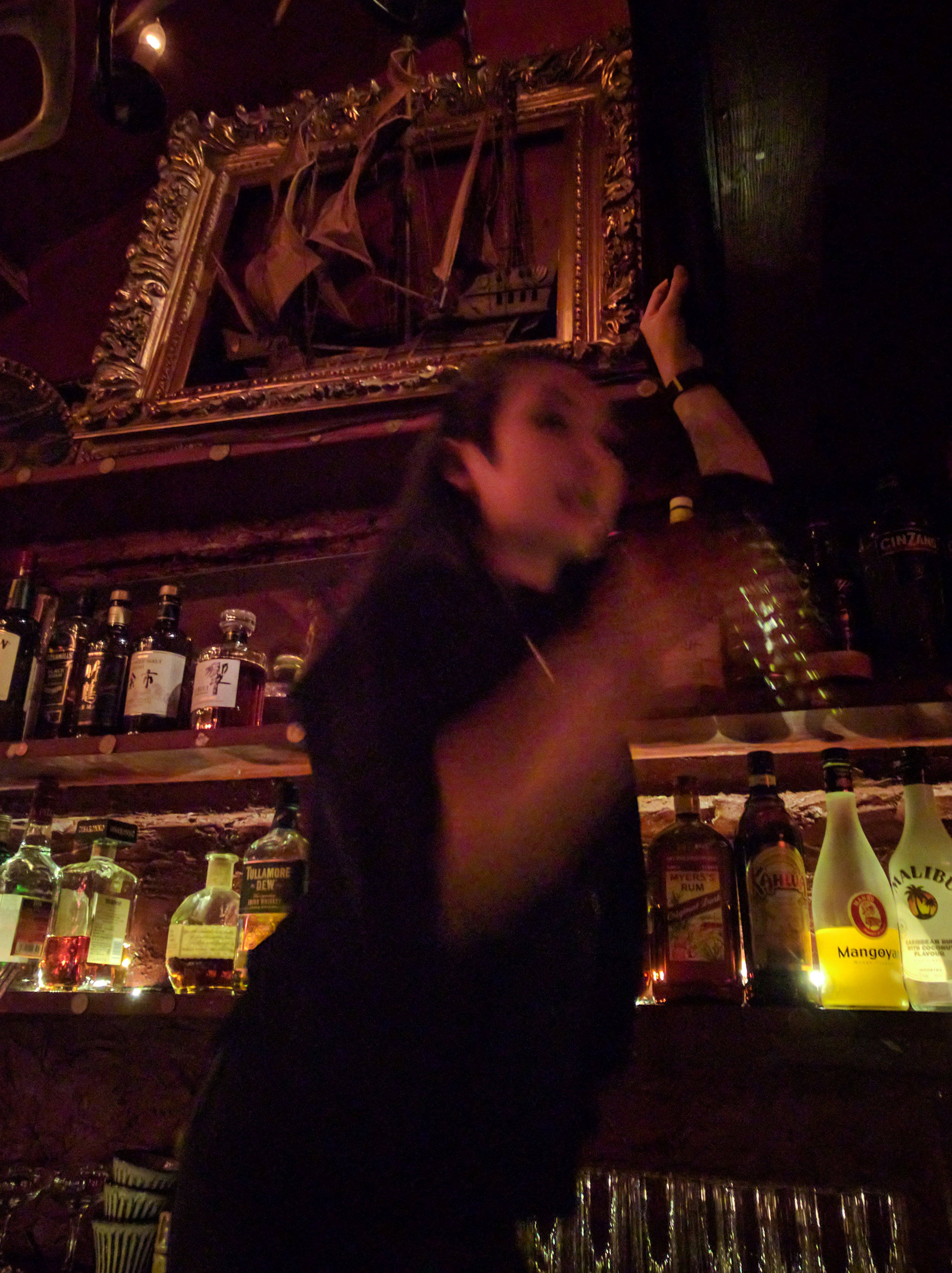 Serving drinks from the 2nd to 3rd floors in the Bar Albatross in Golden Gai