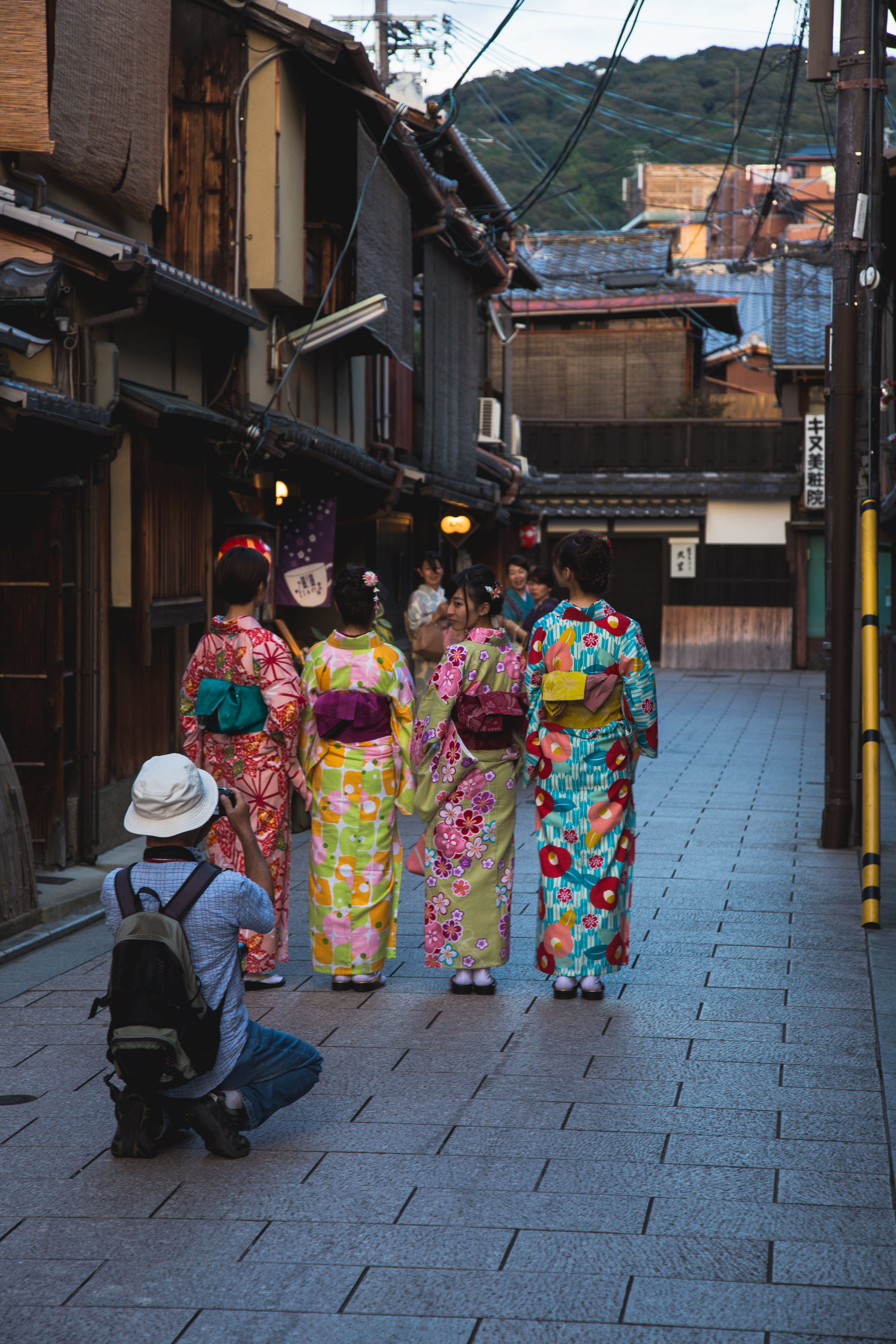 Young teenagers living out the geisha fantasy, and experiencing minor celebrity, in Gion