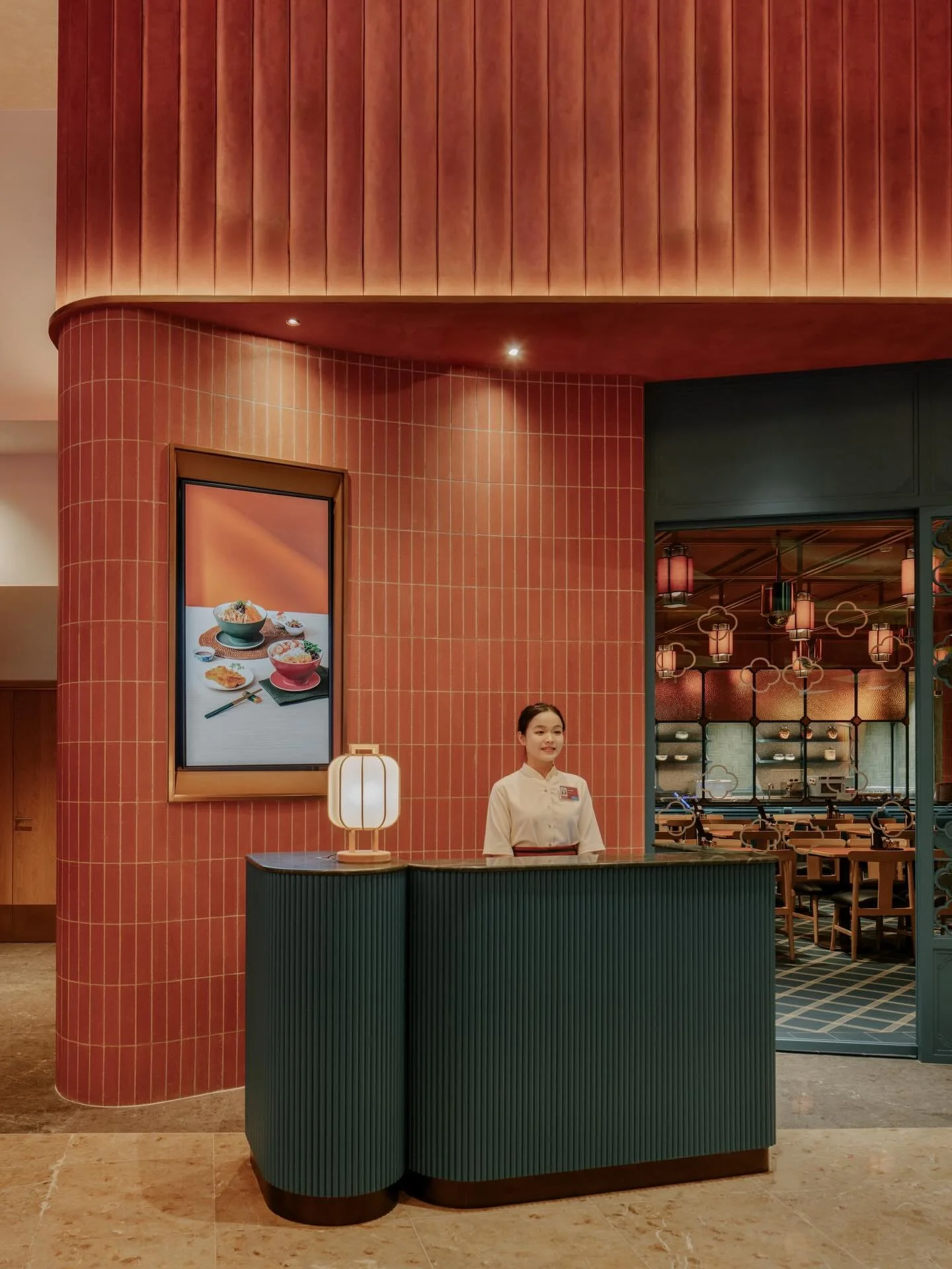 Chinese Restaurant, Singapore

A casual dining venue, celebrating China&rsquo;s regional noodle traditions.
Deep terracotta tones are layered with tile, timber and marble to create a warm, modern and refined interpretation of Northern Chinese design.