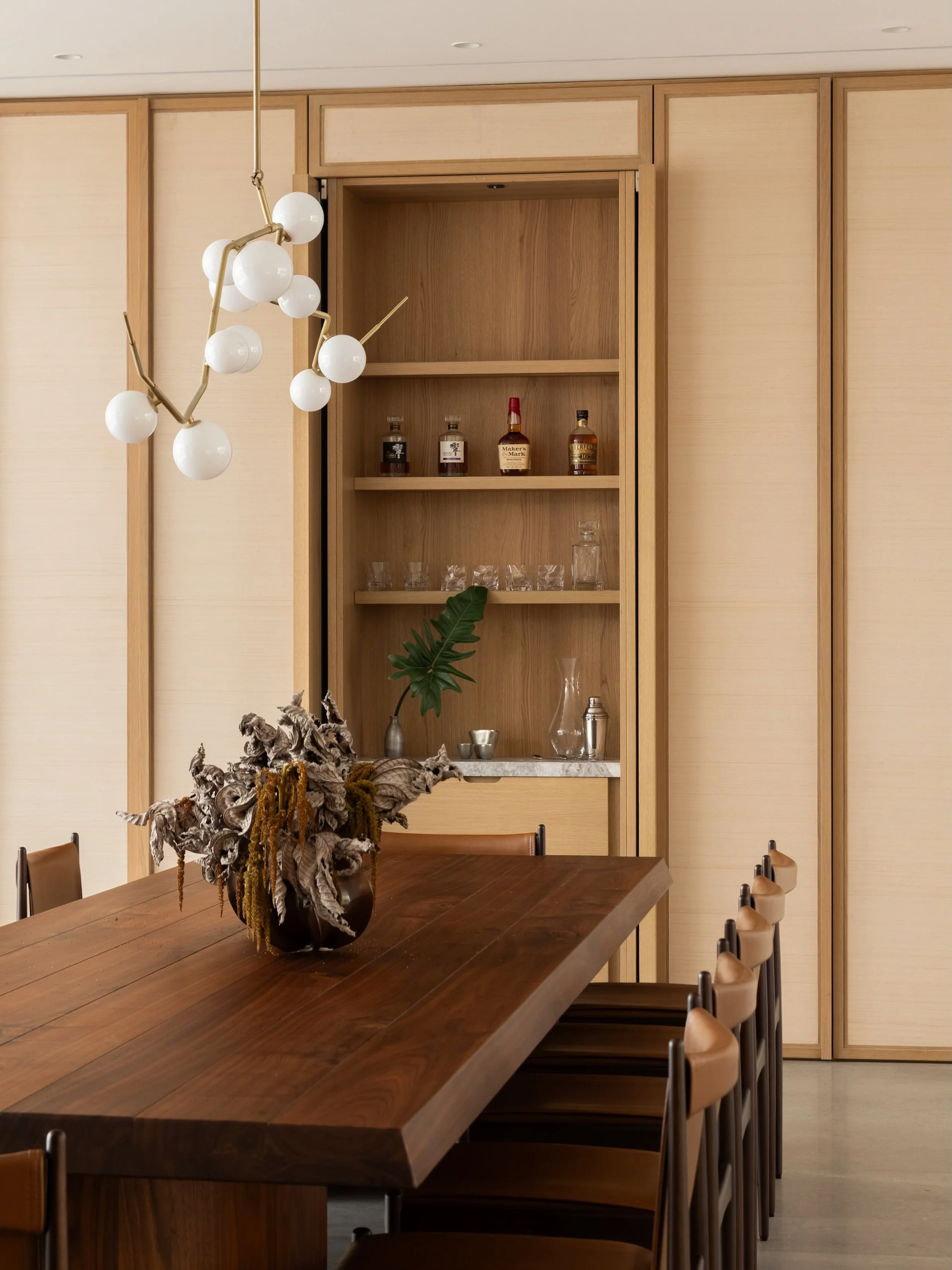 Jakarta Courtyard House

The bar area is concealed behind folding panels in the wall at the end of the dining room.

Photography: @kungphotograph 
Landscape: @thishumidhouse 
Lighting: @switch_lighting_design 

#takenouchiwebb
#interiorarchitecture 
