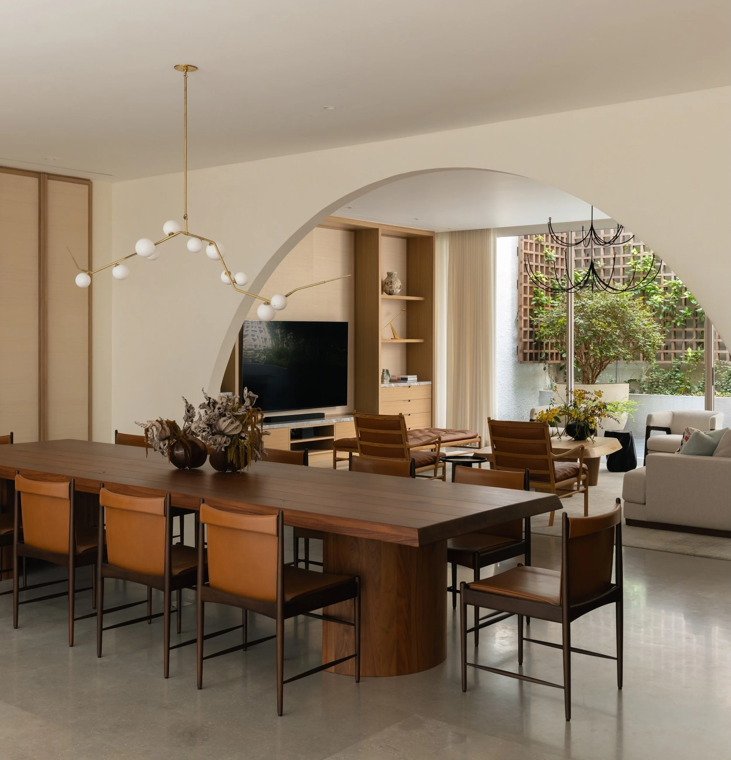 Jakarta Courtyard House

The dining and living rooms are a single space, visually separated by an arched wall. Both areas look onto courtyards that bring light and greenery to the interior.

Photography: @kungphotograph 
Landscape: @thishumidhouse 
L