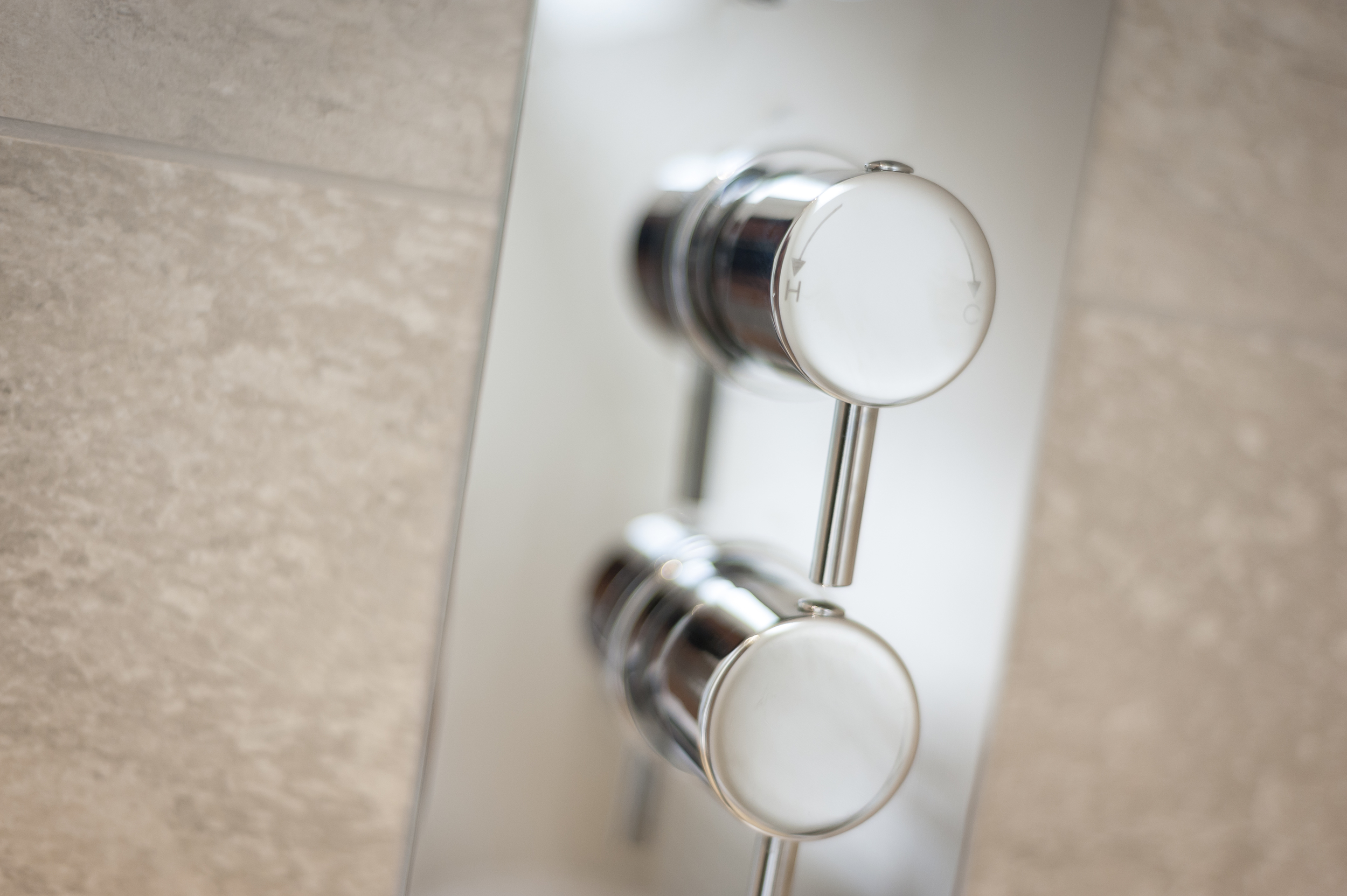 Detail of Polished Chrome Shower Controls