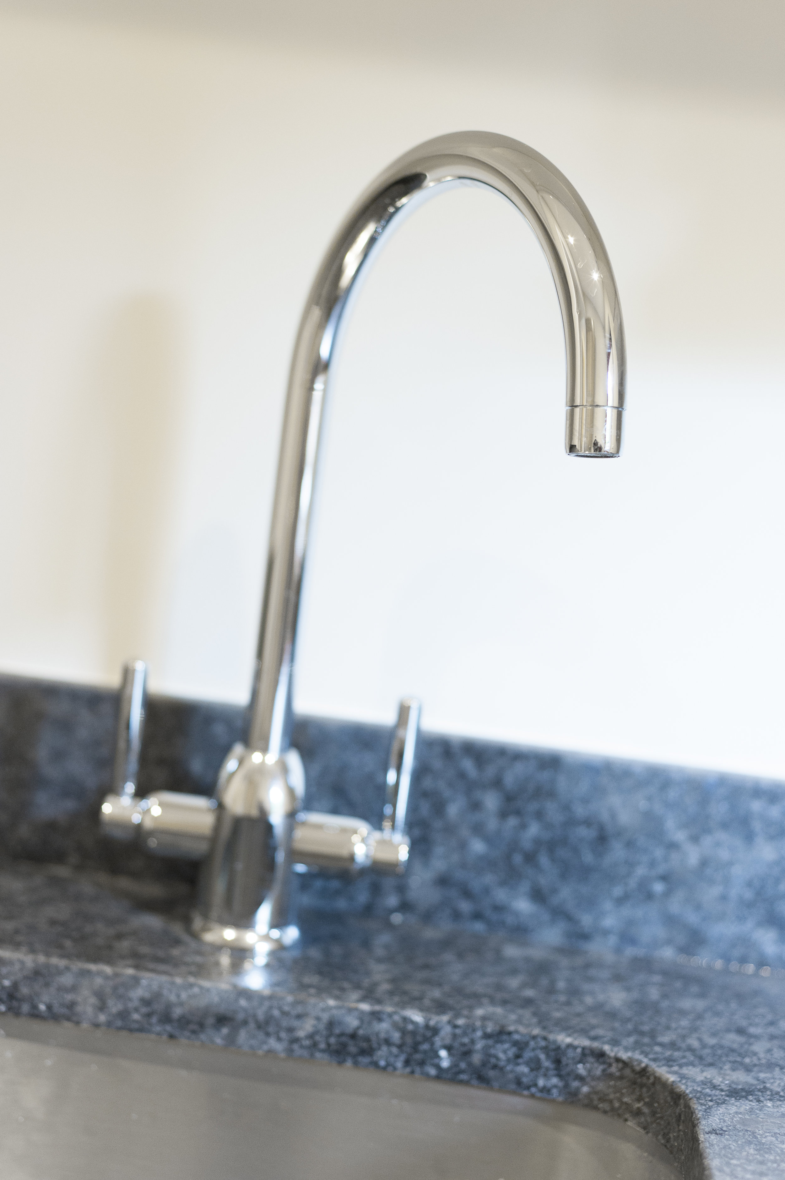 Chrome Mixer Tap and Granite Work Top