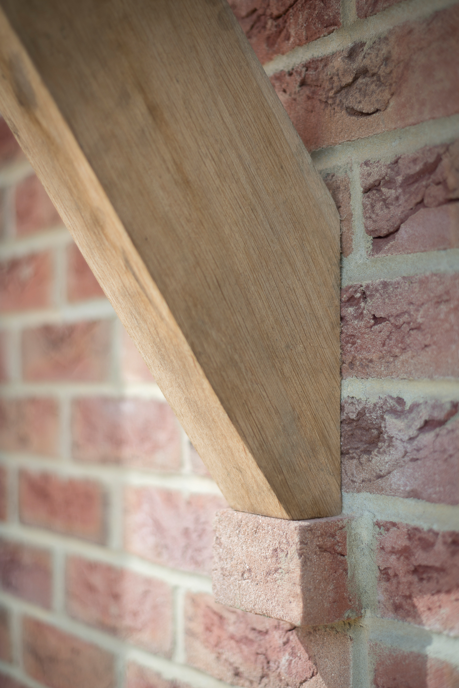 Green Oak Porch Supported by Stepped Brick Detail