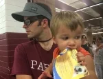 Colby Sharp's son sinks his teeth into the FENWAY & HATTIE postcard