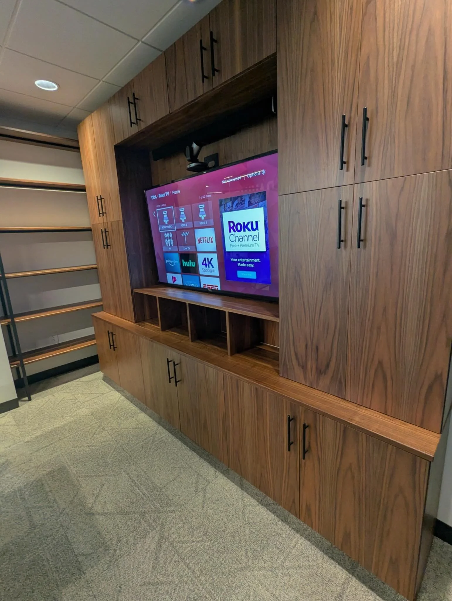 Custom walnut cabinets and credenzas for @risk3sixty HQ