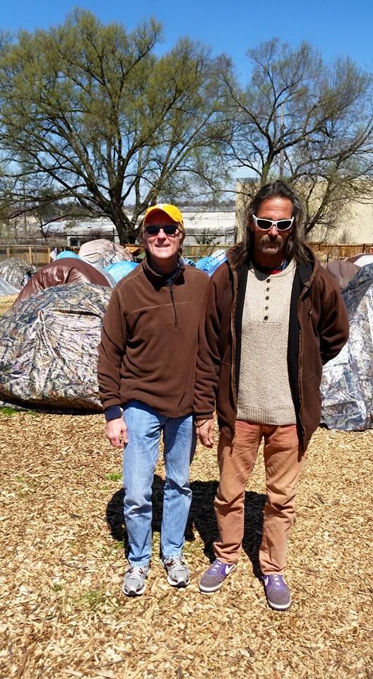 Volunteer Rich Sanderson with a friend at Green Street Church of Christ. 